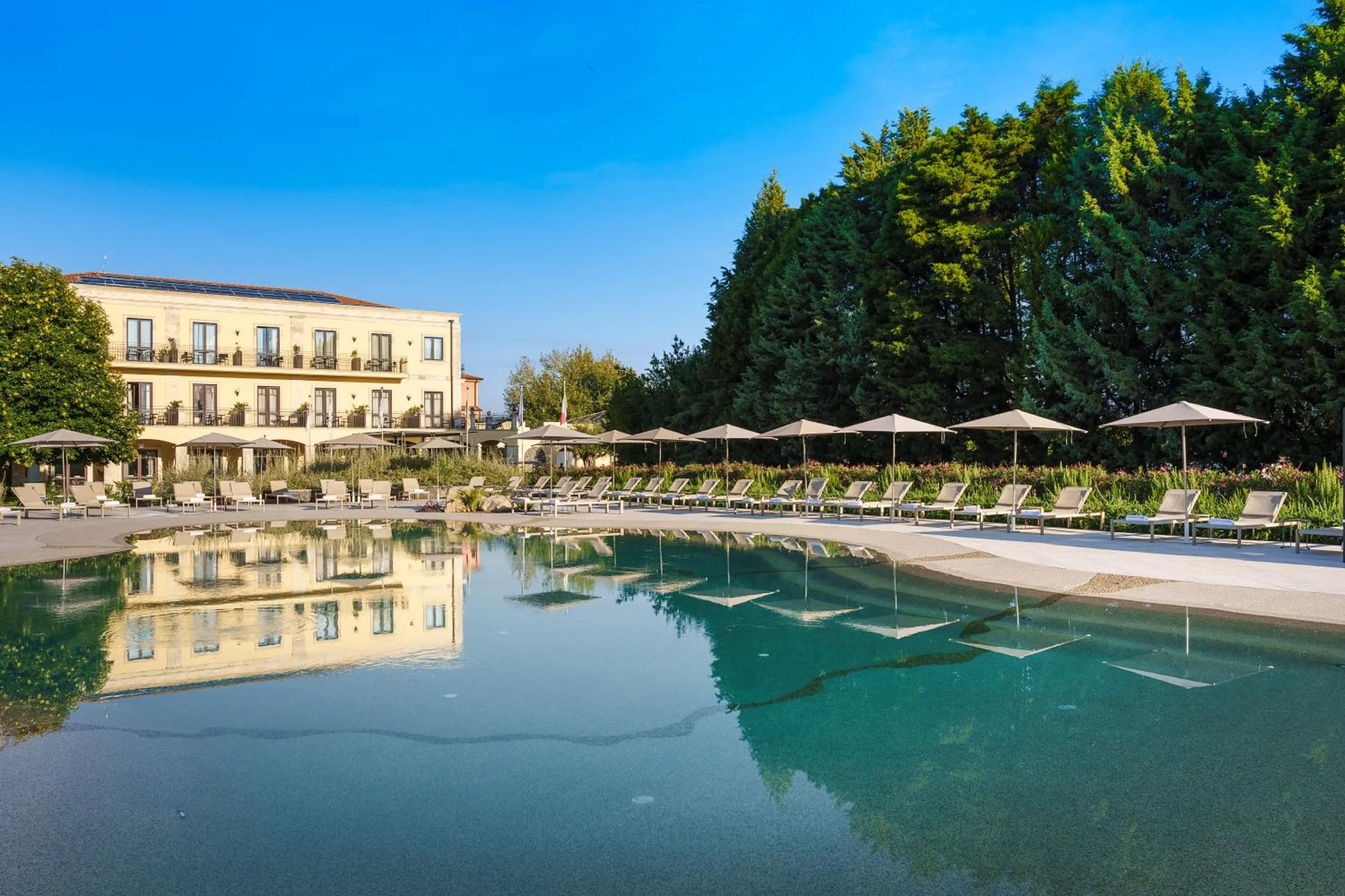 Swimming pool in Picciolo Etna Golf Resort & Spa, Curio Collection by Hilton