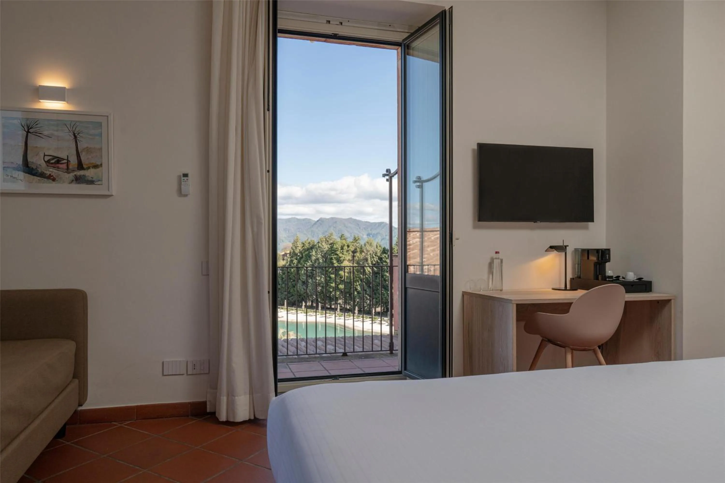 Photo of the whole room, Bed in Picciolo Etna Golf Resort & Spa, Curio Collection by Hilton