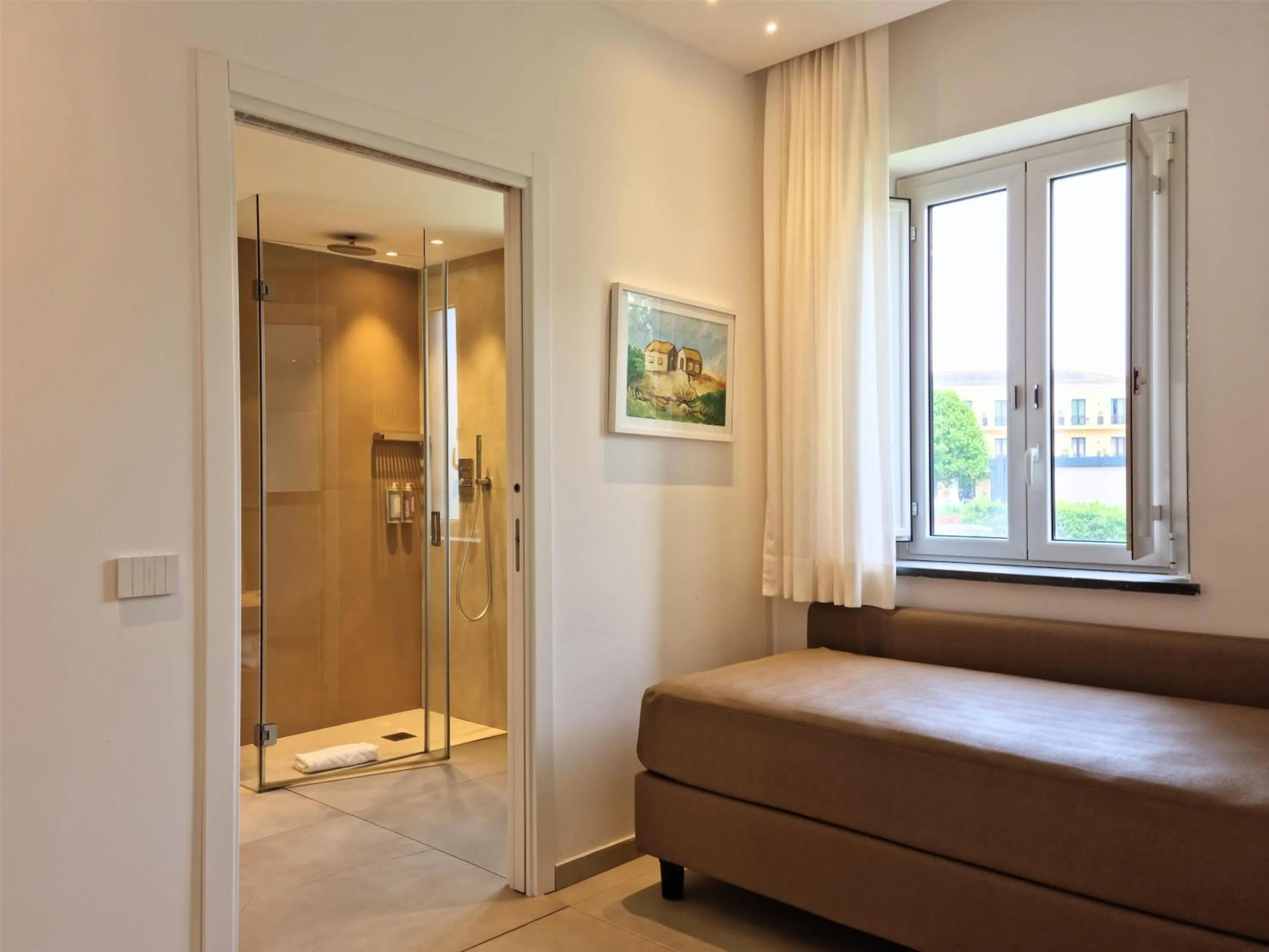 Living room, Bed in Picciolo Etna Golf Resort & Spa, Curio Collection by Hilton