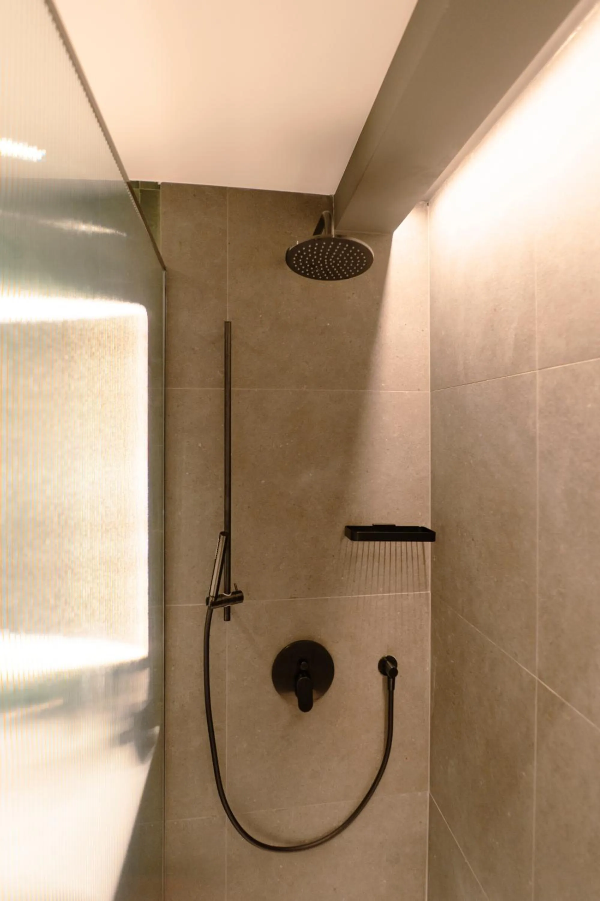 Shower in Picciolo Etna Golf Resort & Spa, Curio Collection by Hilton