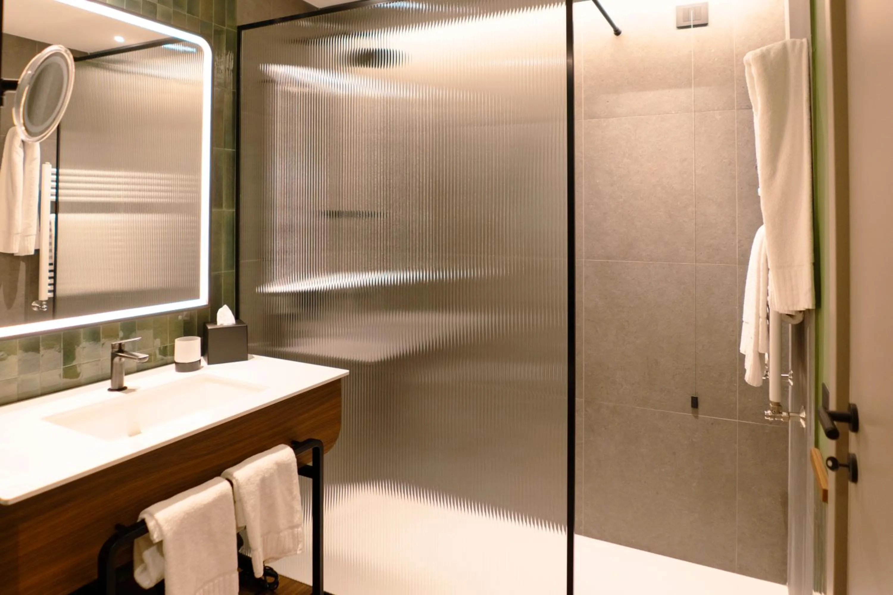 Bathroom in Picciolo Etna Golf Resort & Spa, Curio Collection by Hilton