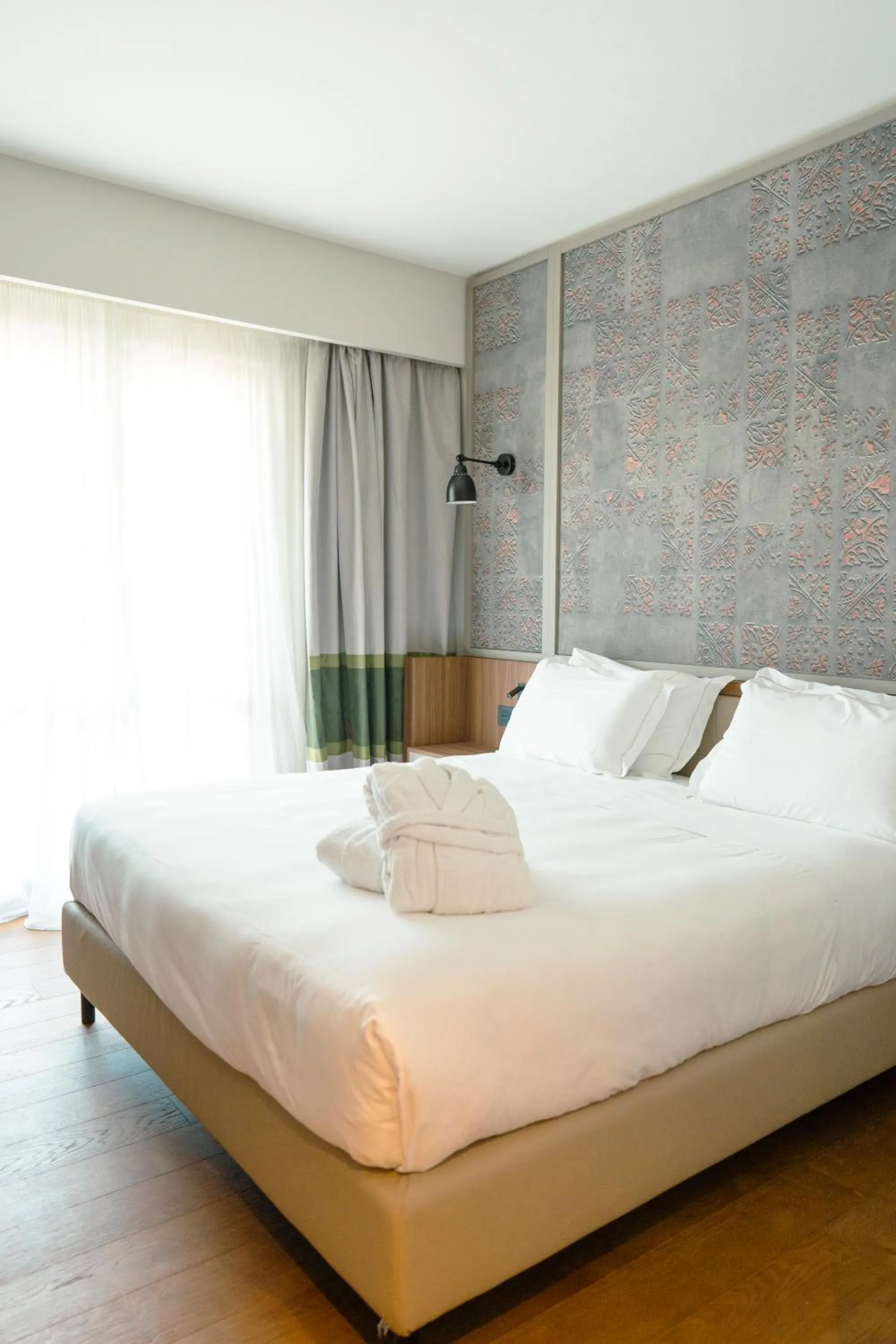 Bedroom, Bed in Picciolo Etna Golf Resort & Spa, Curio Collection by Hilton