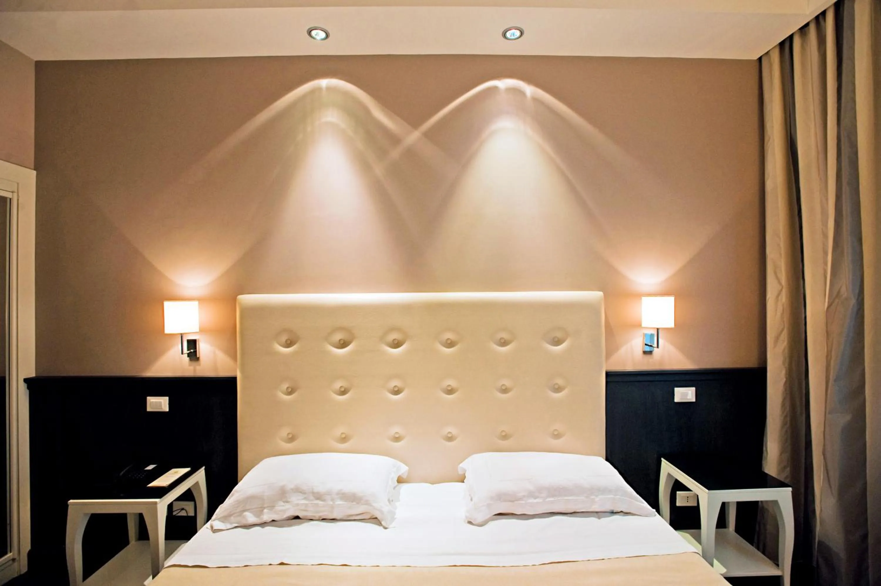 Bed in Hotel Mediterraneo