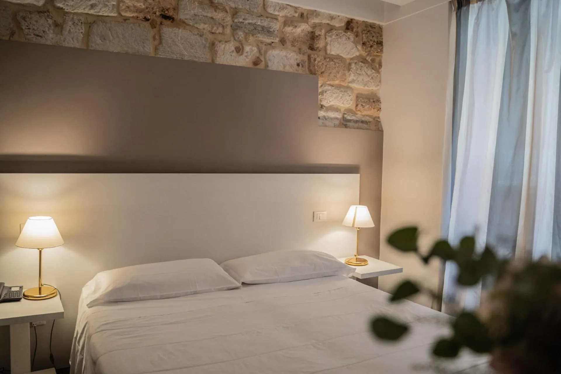 Bed in Hotel Mediterraneo