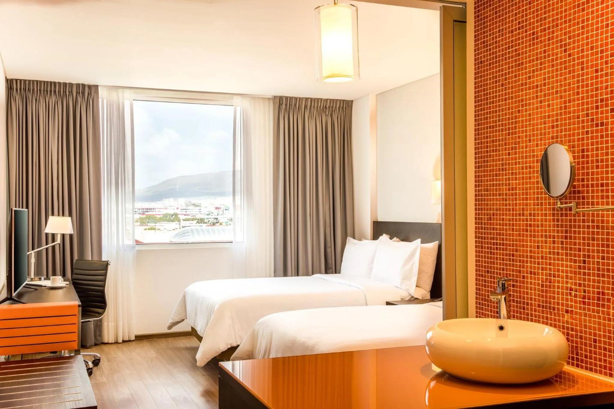 Photo of the whole room, Bed in Fiesta Inn Pachuca Gran Patio