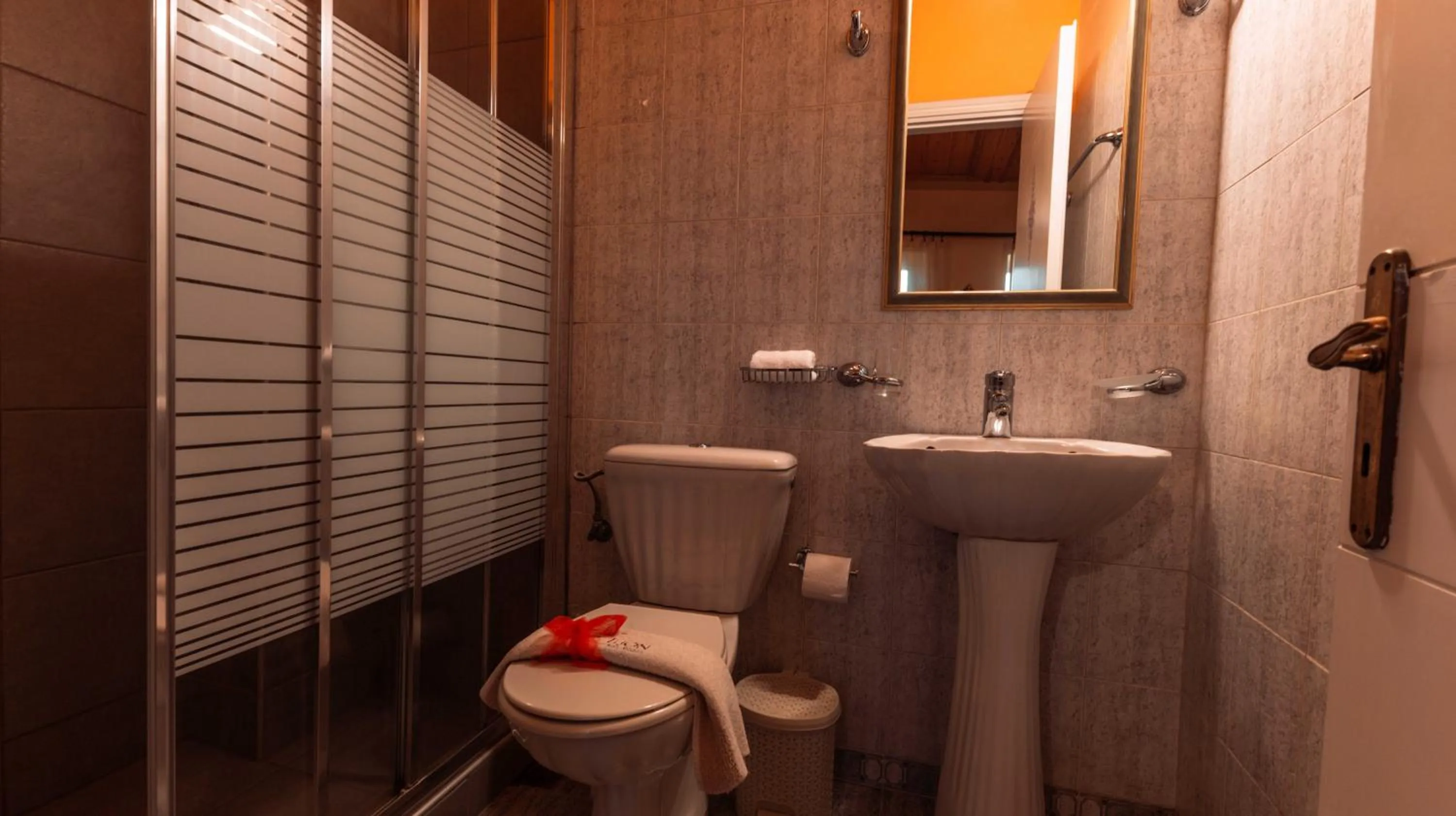 Toilet in Ilion Hotel