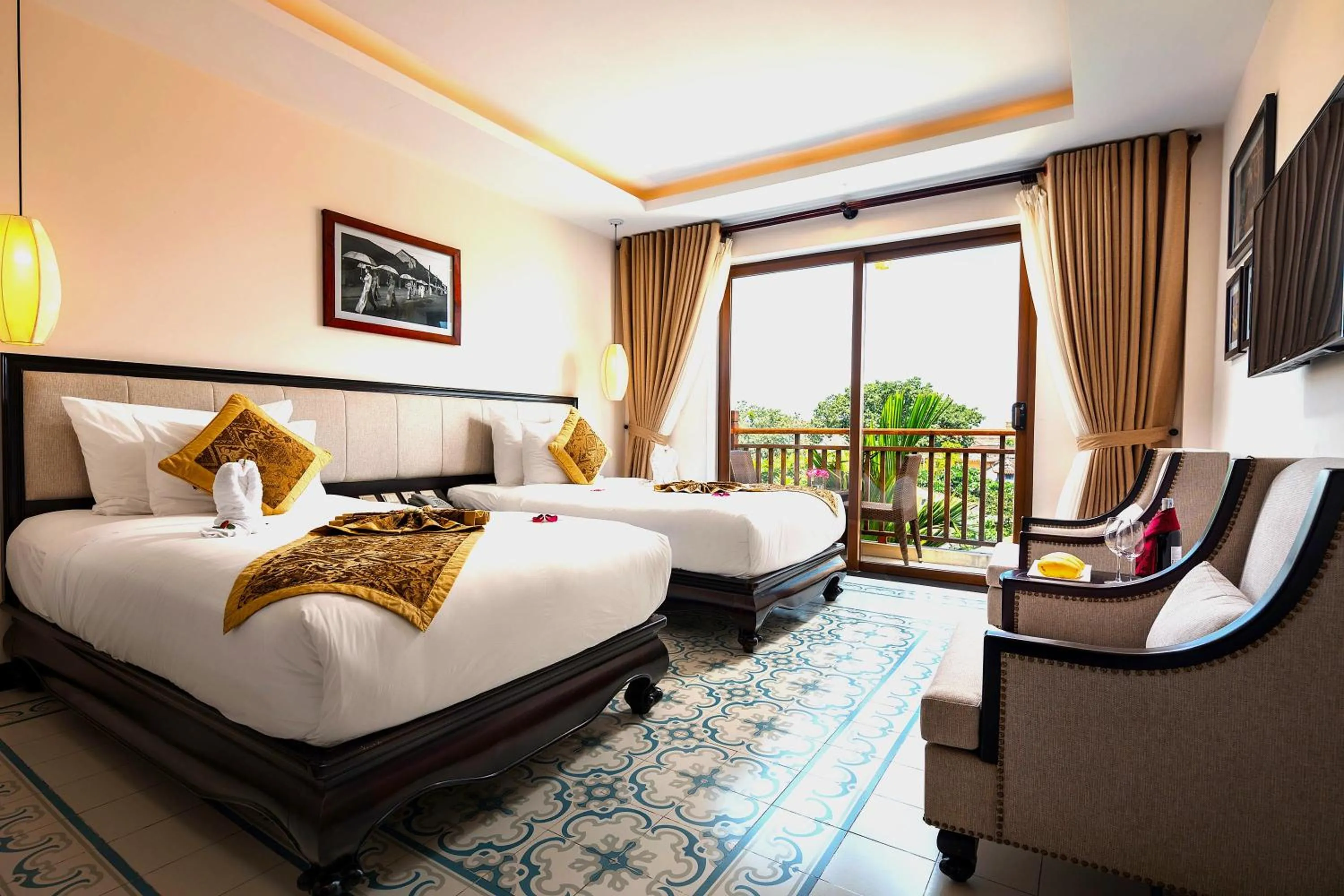 Photo of the whole room, Bed in Silkotel Hoi An