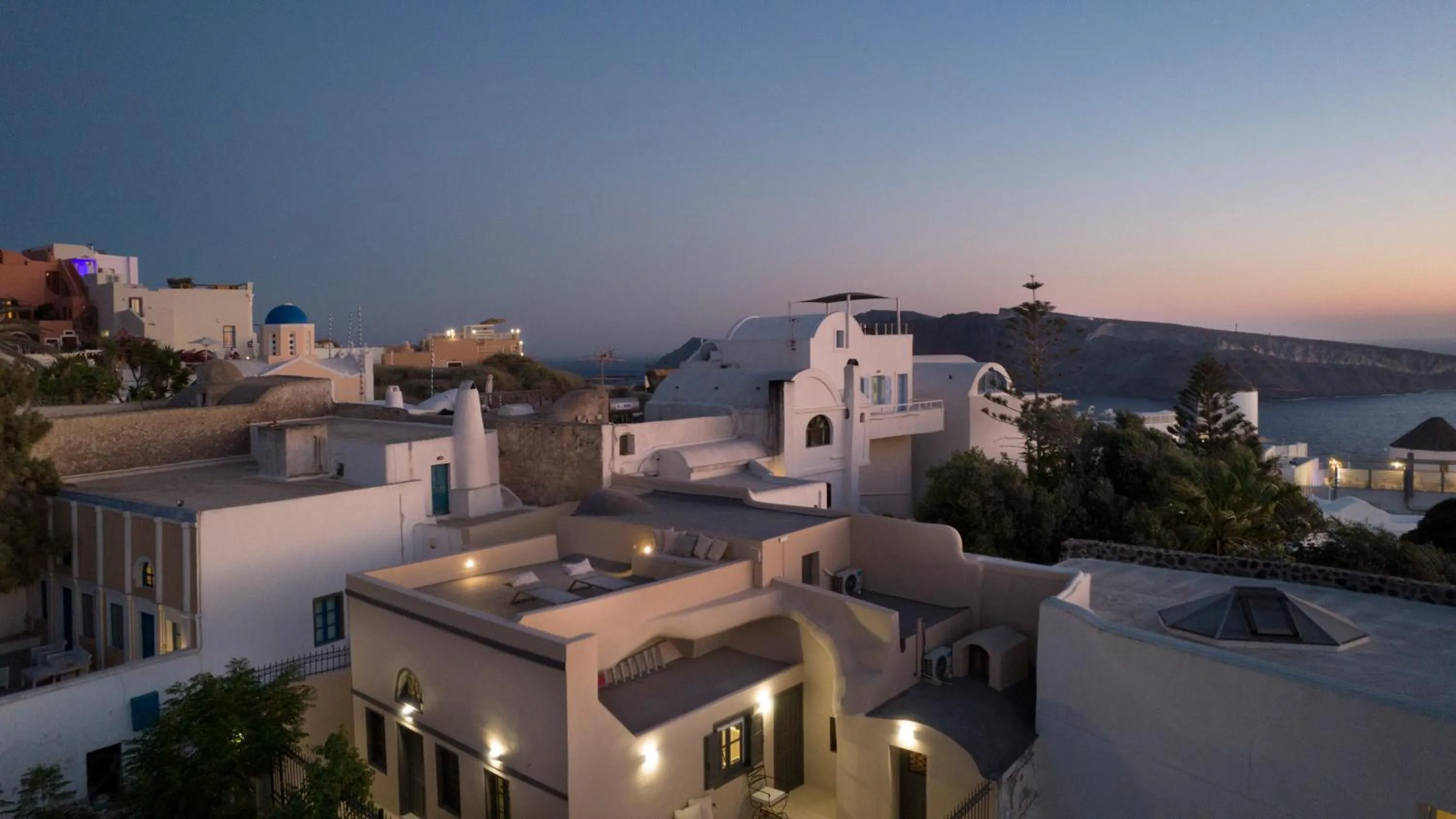 Facade/entrance in OIA UNIQUE HOMES by K&K