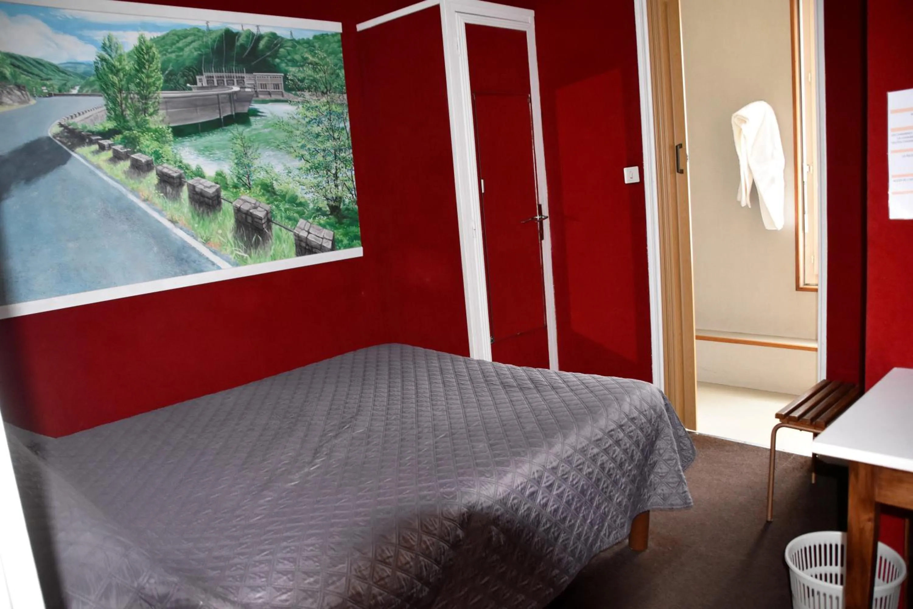 Bedroom in Hôtel Le Rider