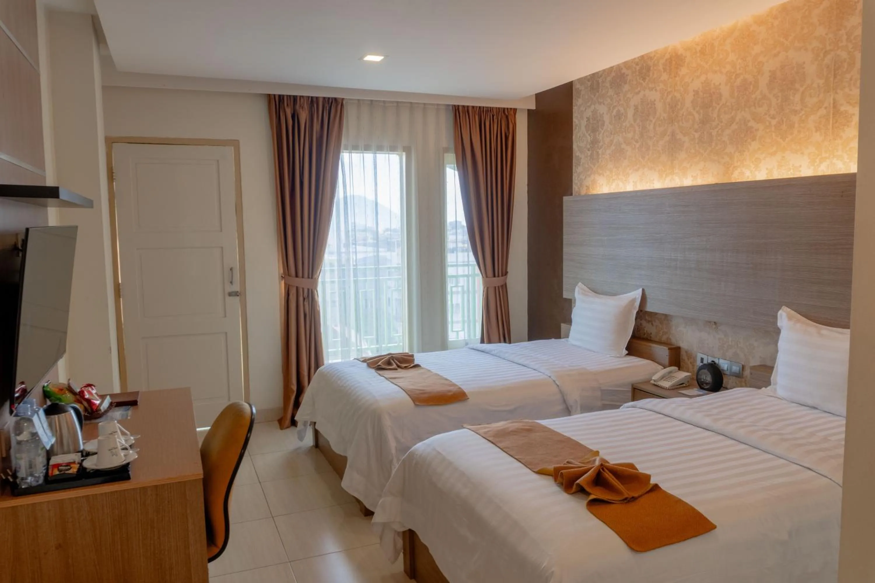 Bed in Muara Hotel and Mall Ternate