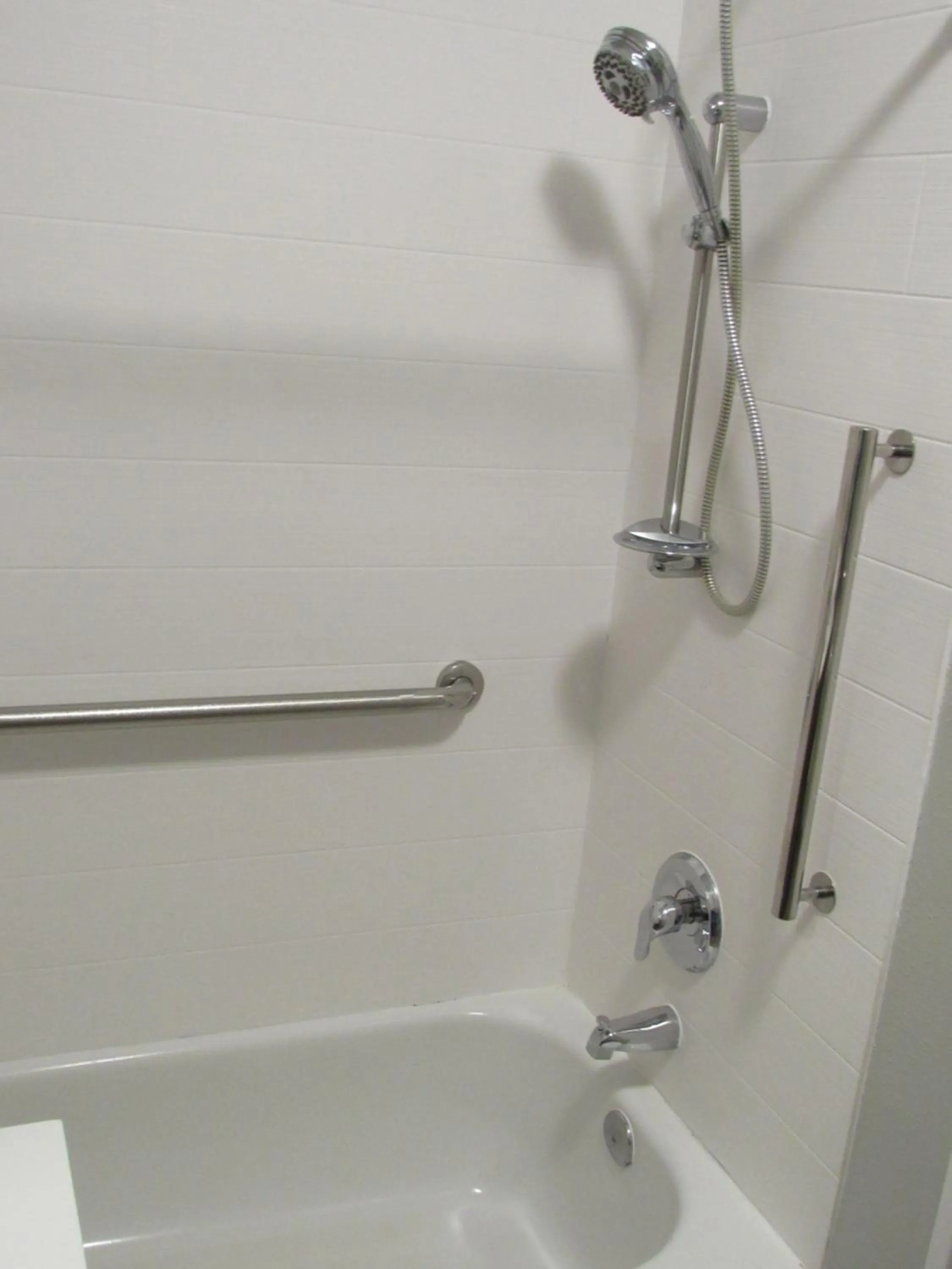 Shower in Holiday Inn Express Hotel & Suites Lincoln South by IHG