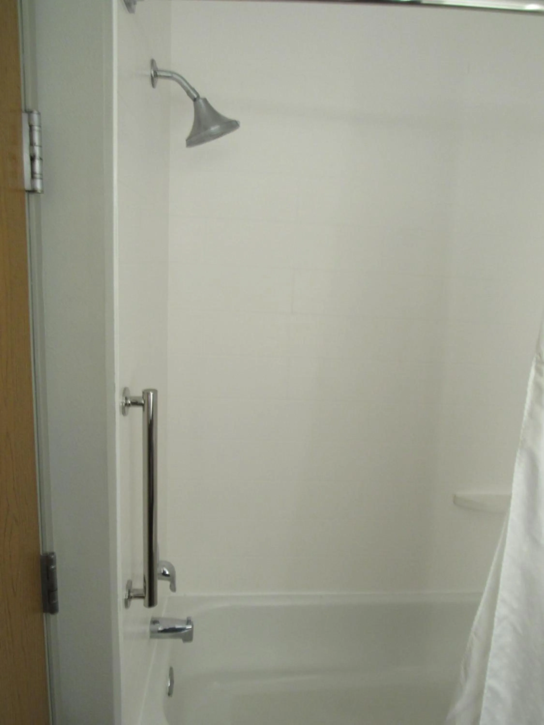 Shower in Holiday Inn Express Hotel & Suites Lincoln South by IHG