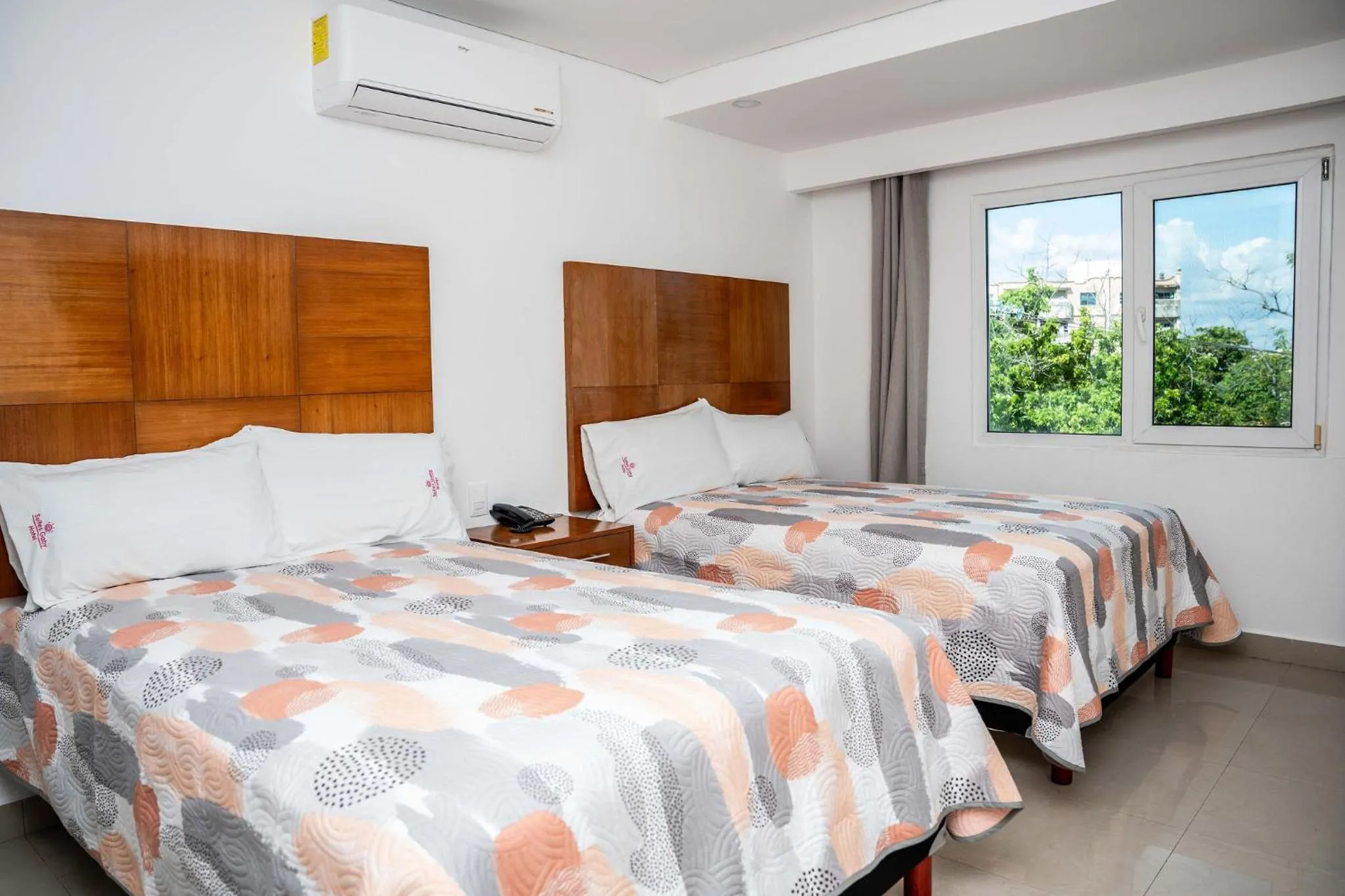 Bed in Hotel Suites Gaby