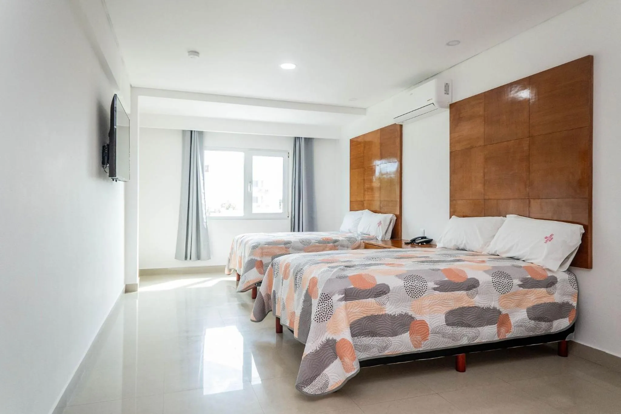 Bed in Hotel Suites Gaby