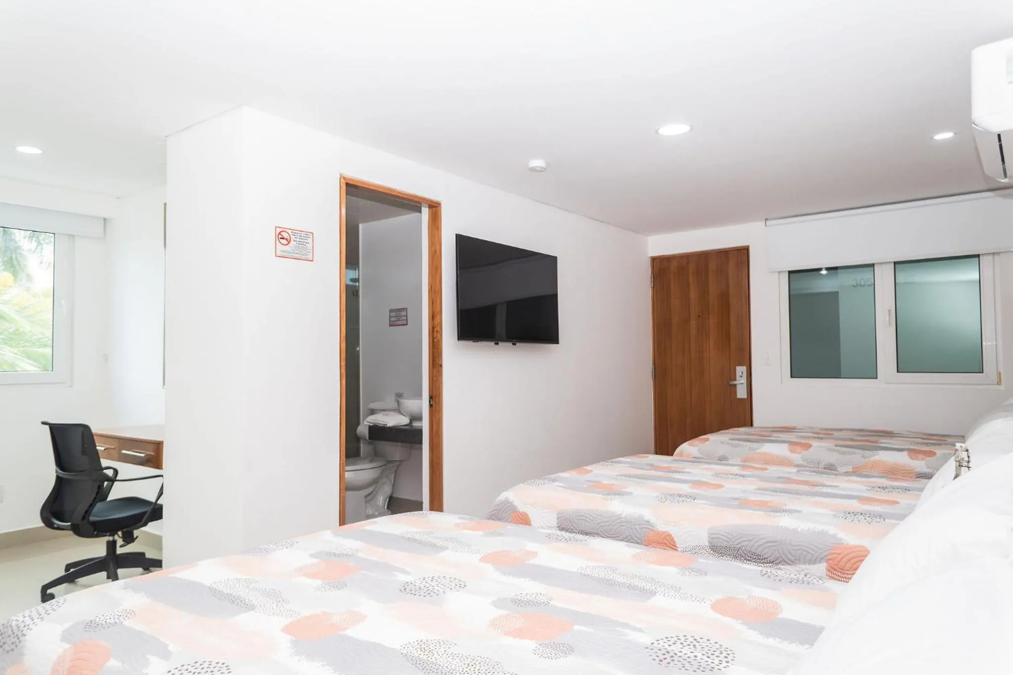 Bed in Hotel Suites Gaby