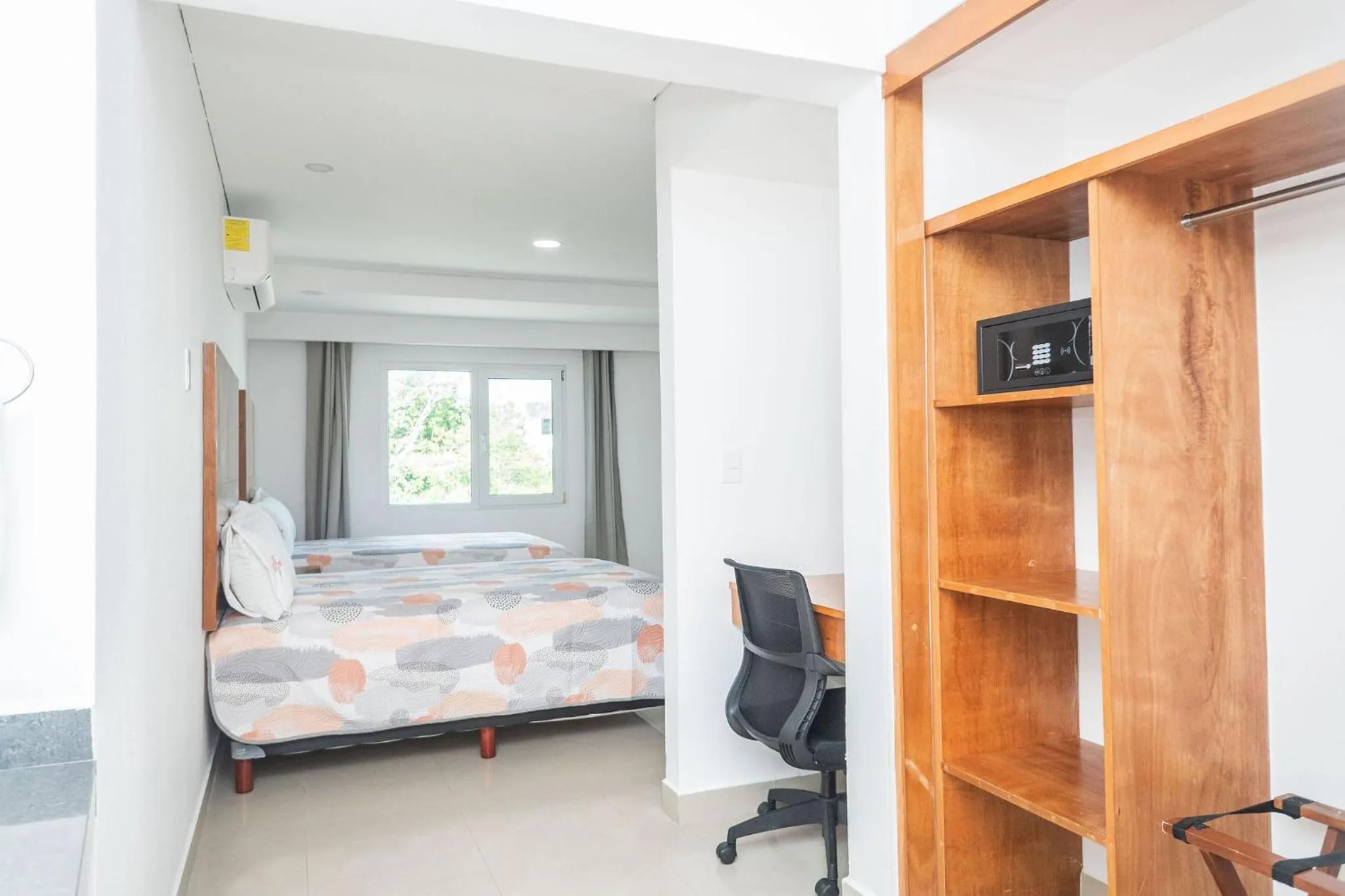 Bed in Hotel Suites Gaby