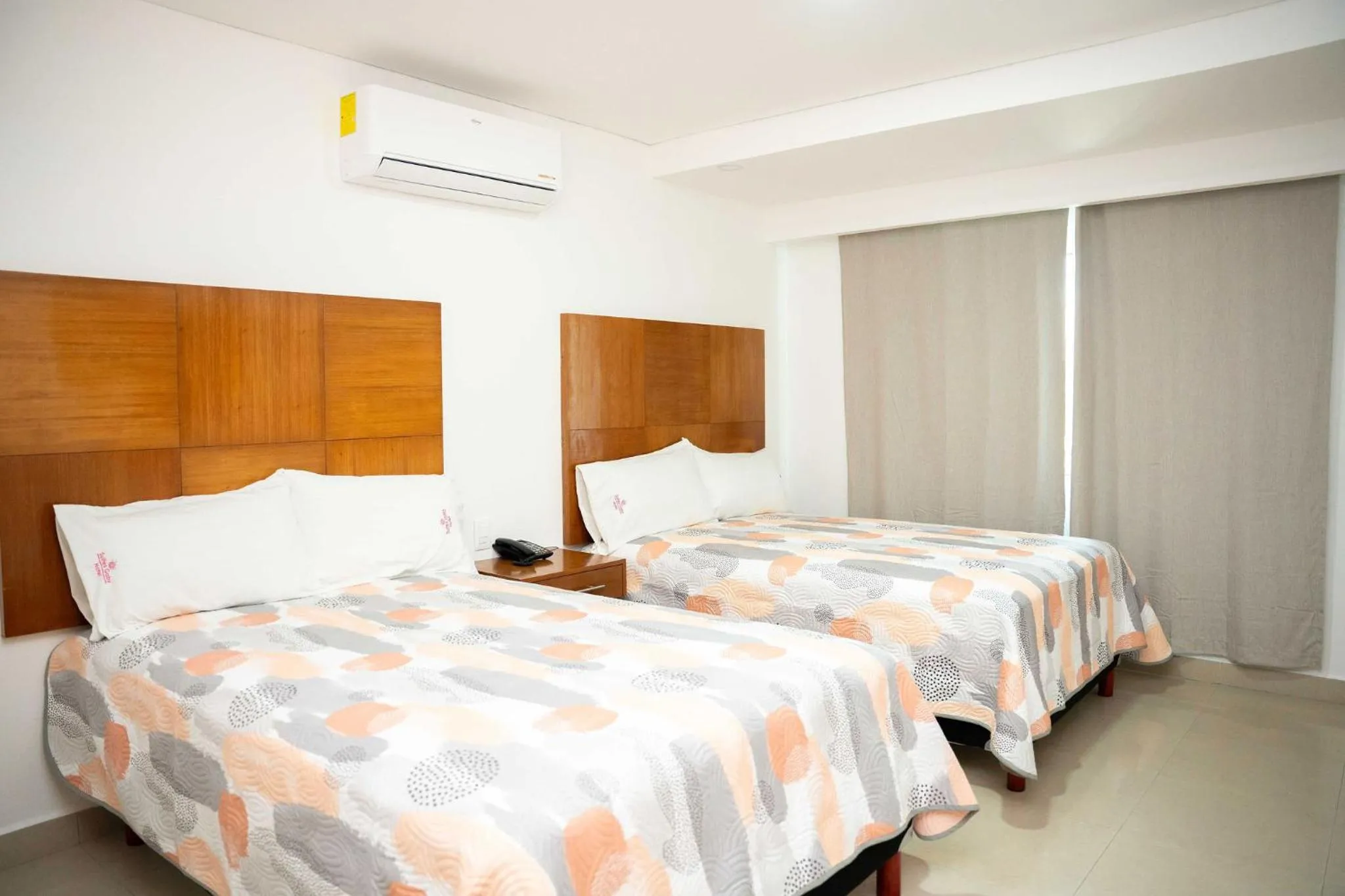 Bed in Hotel Suites Gaby