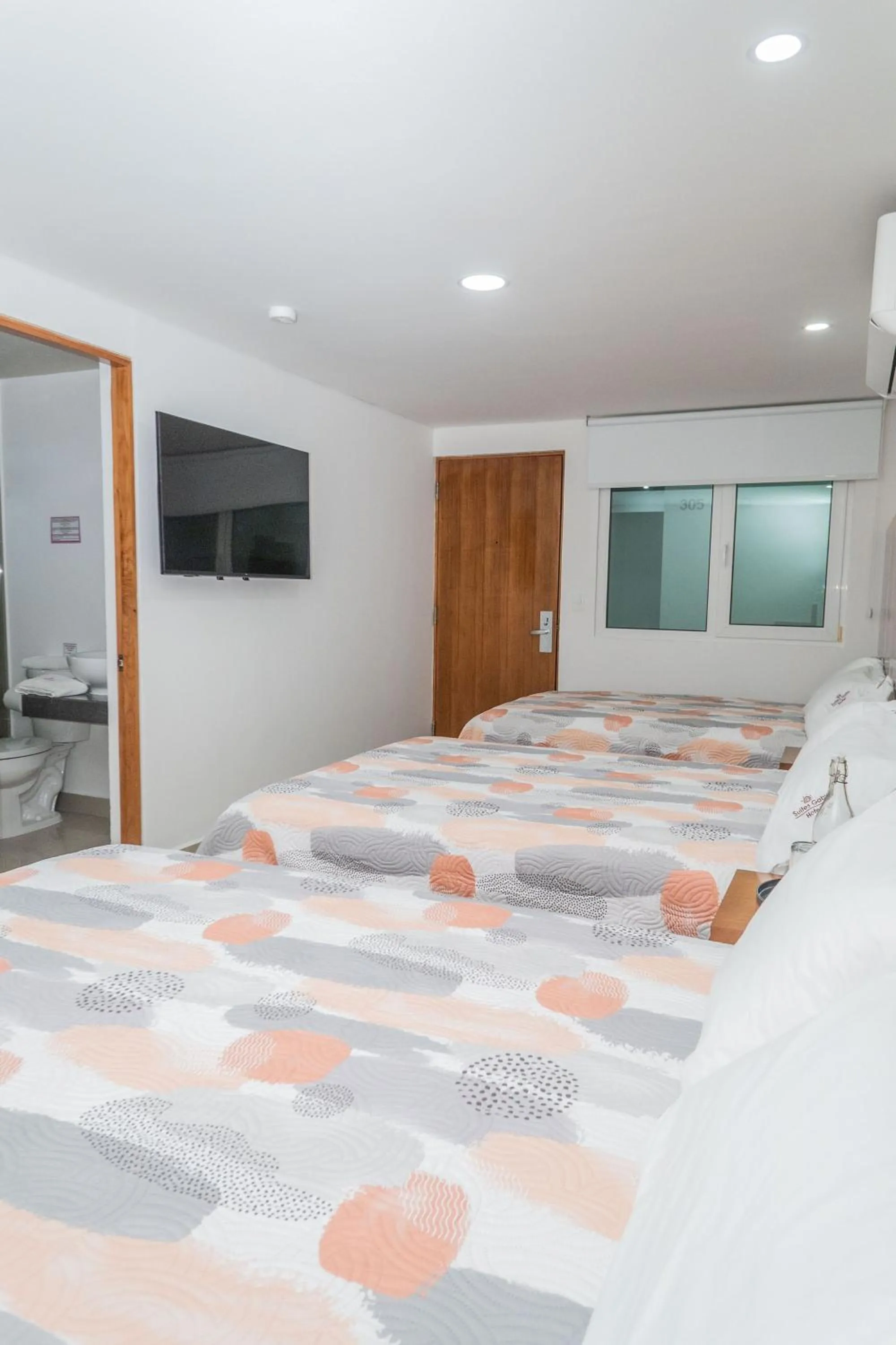 Bed in Hotel Suites Gaby