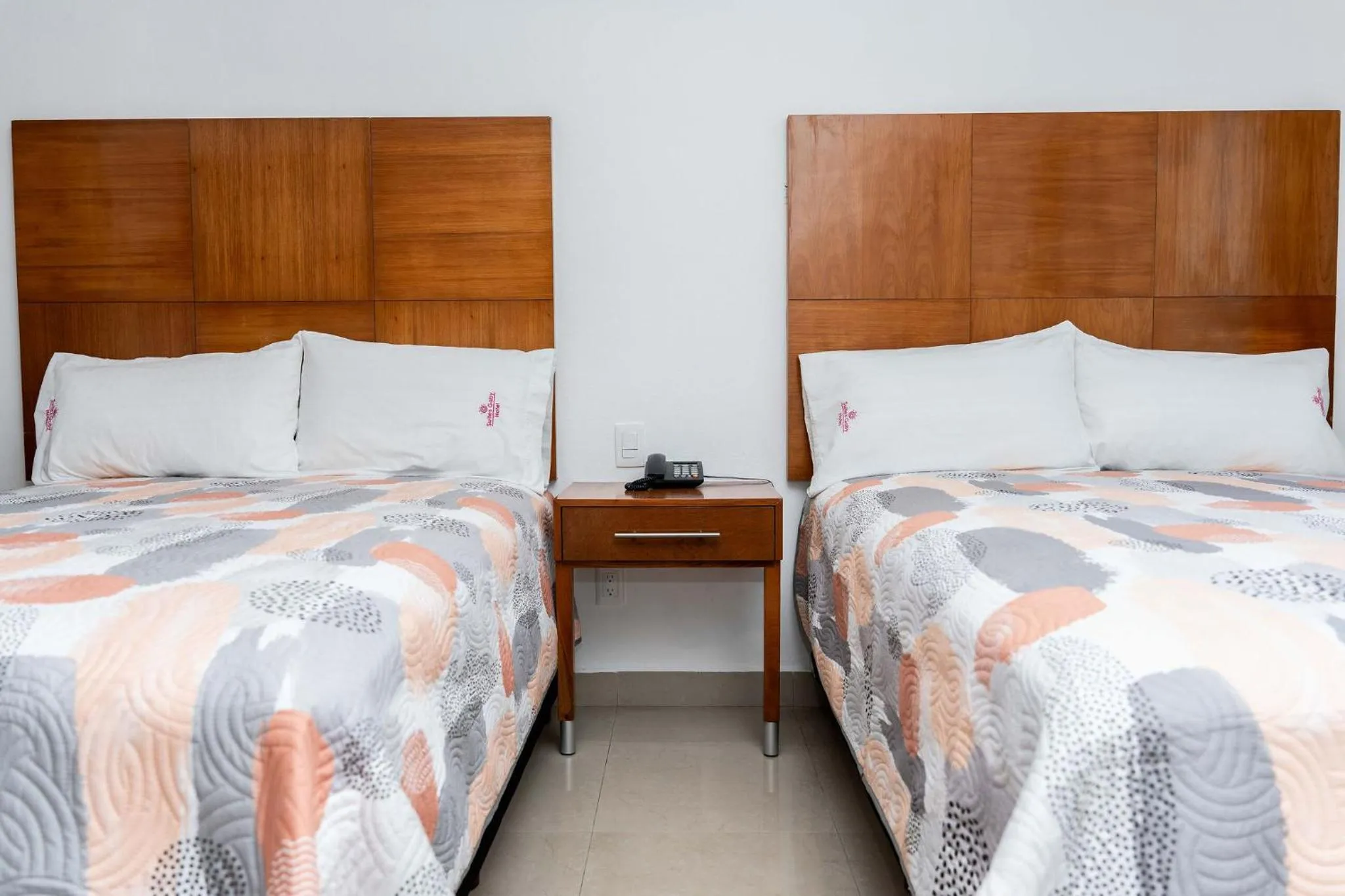 Bed in Hotel Suites Gaby