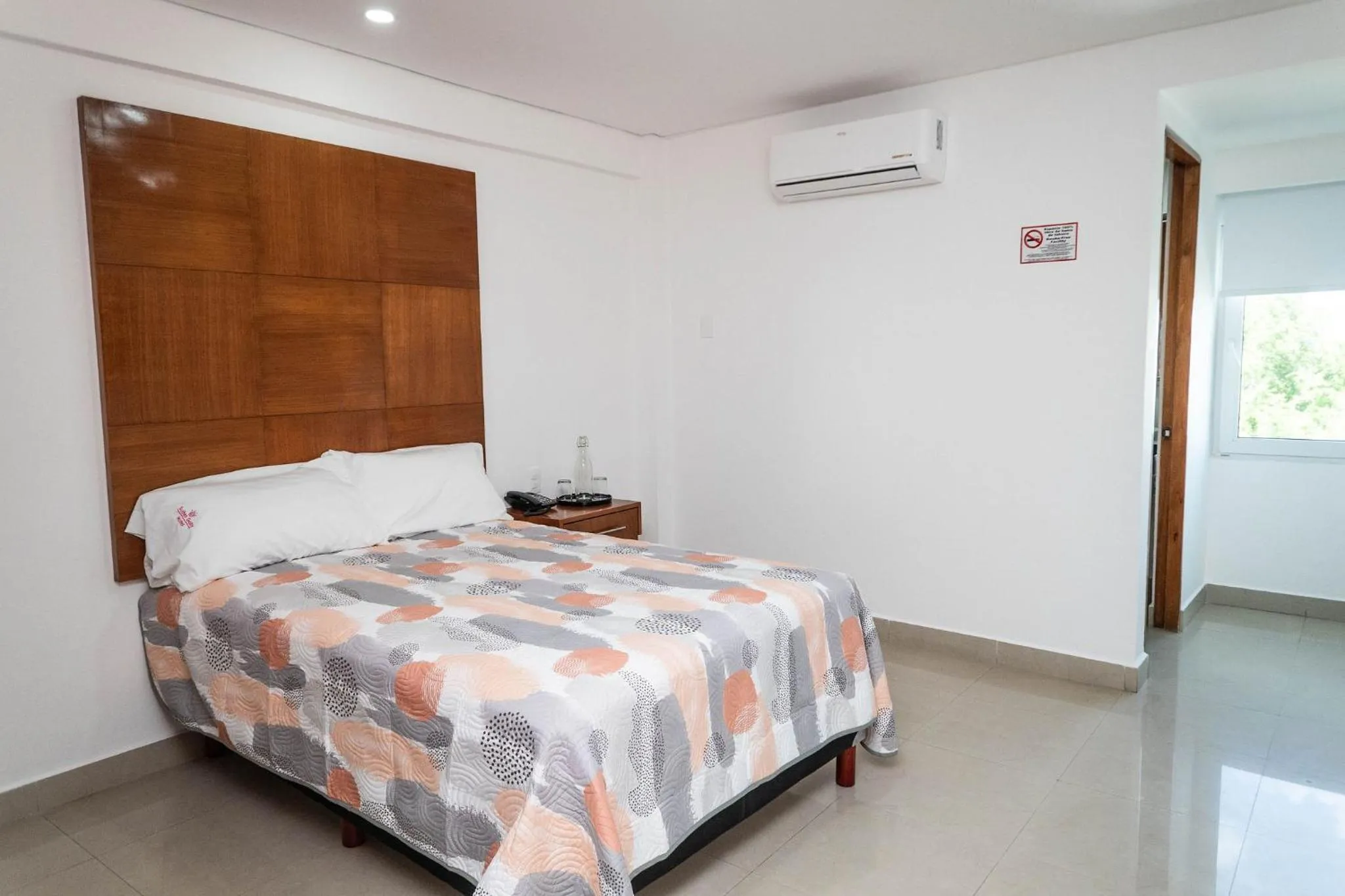 Bed in Hotel Suites Gaby