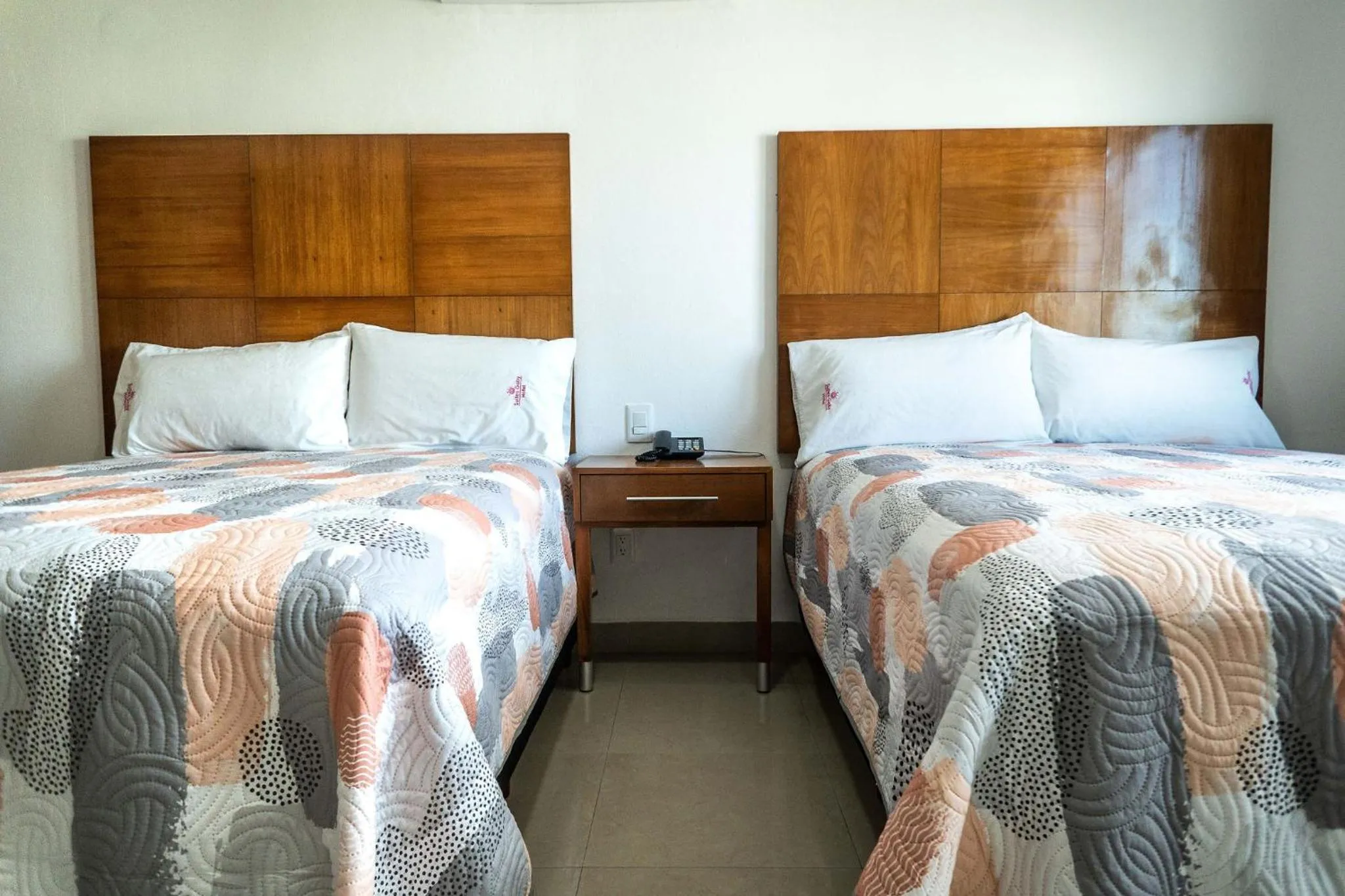 Bed in Hotel Suites Gaby