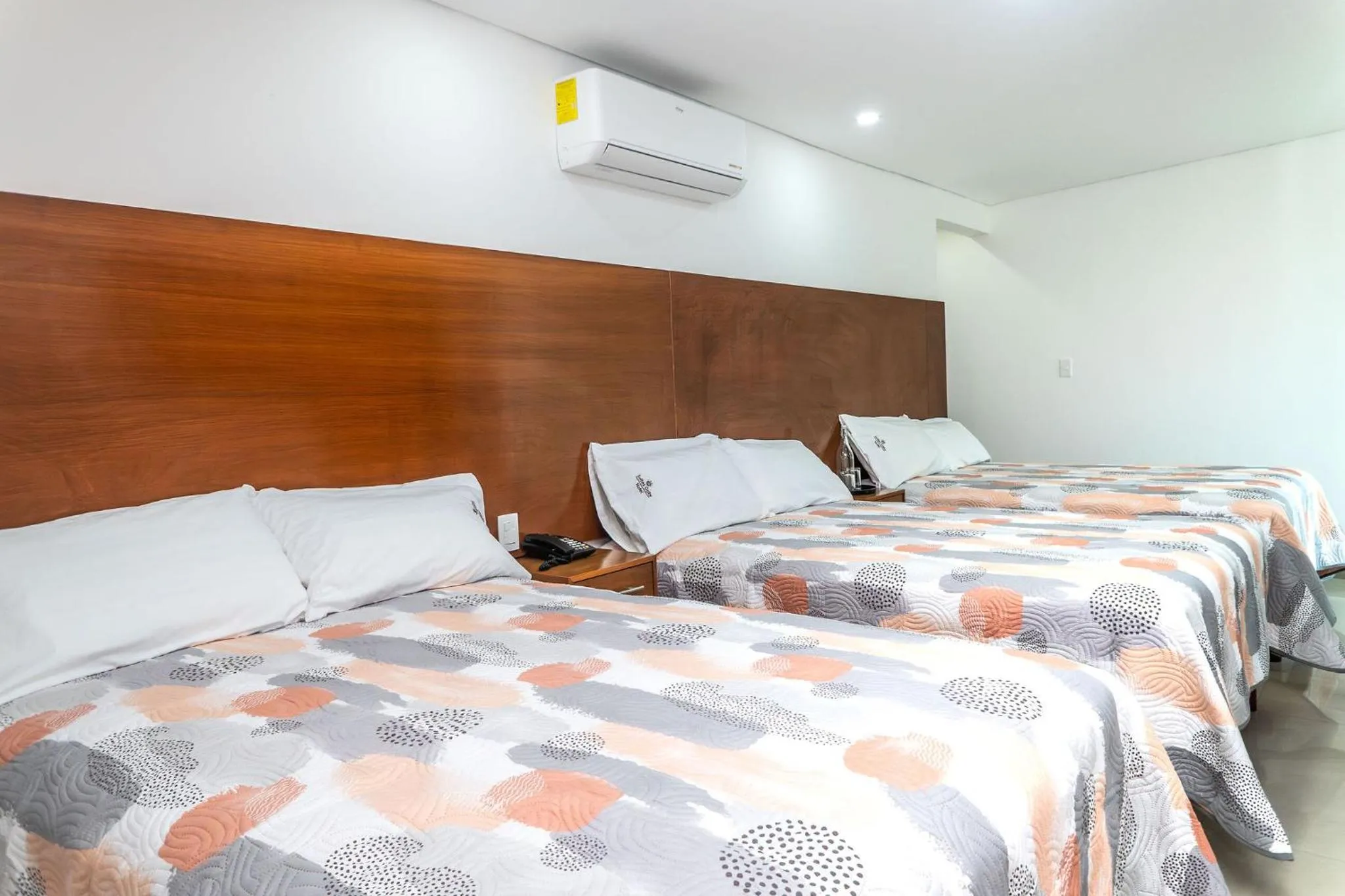 Bed in Hotel Suites Gaby