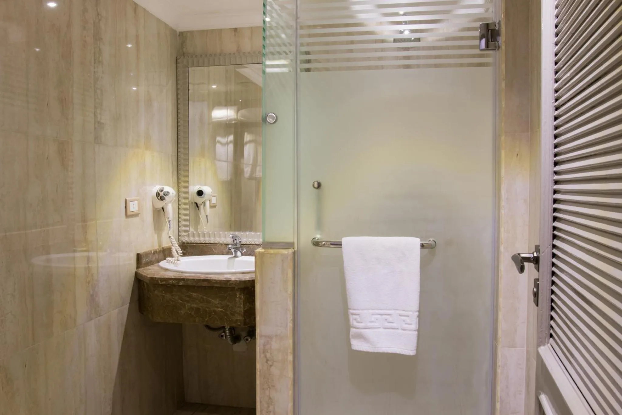 Bathroom in Paradise Inn Beach Resort