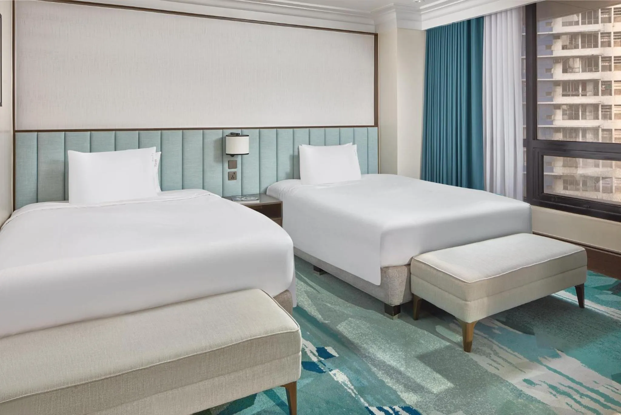 Photo of the whole room, Bed in Holiday Inn & Suites Manila Galleria by IHG