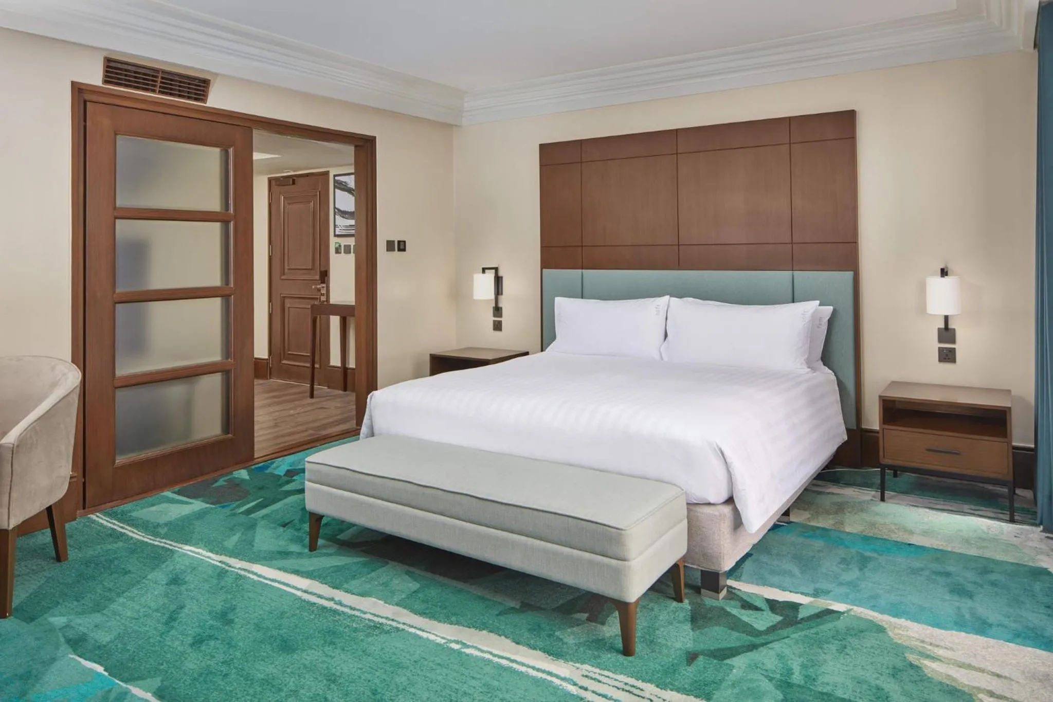 Photo of the whole room, Bed in Holiday Inn & Suites Manila Galleria by IHG
