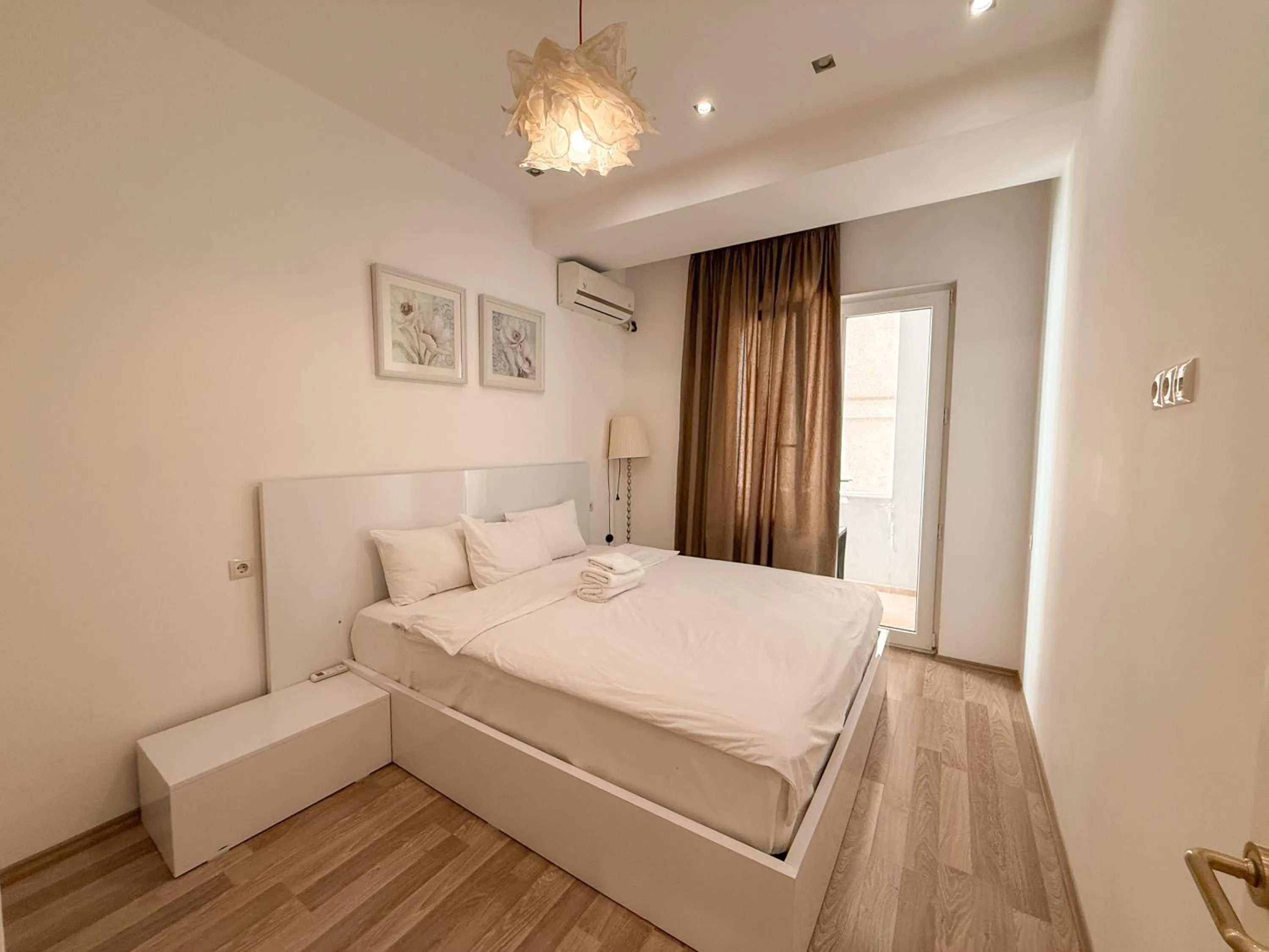 Bed in Maxela Apartments