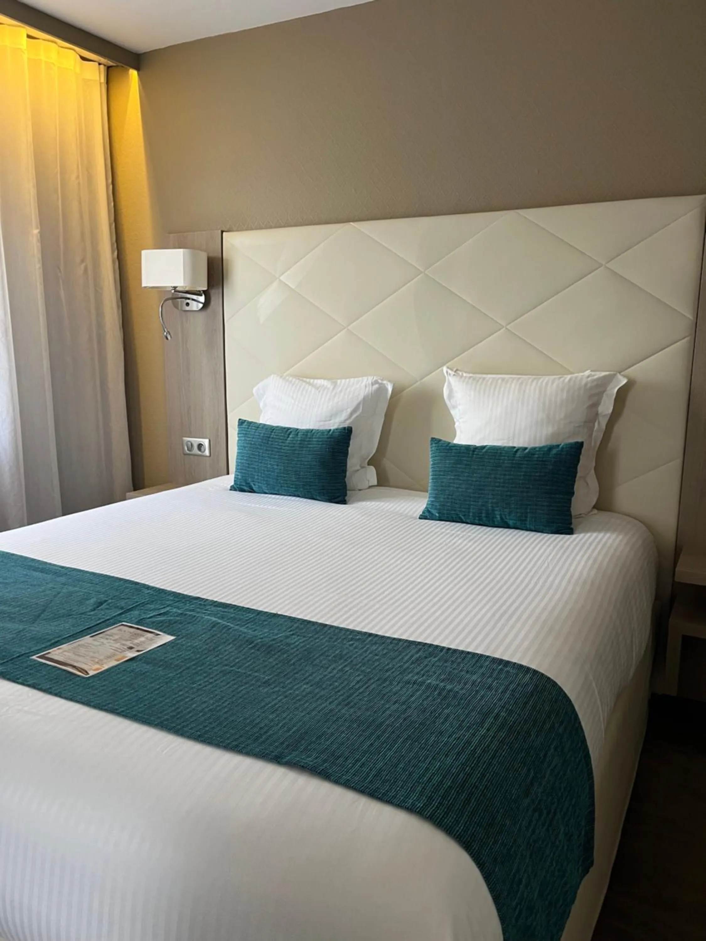 Bed in Hotel Normandy