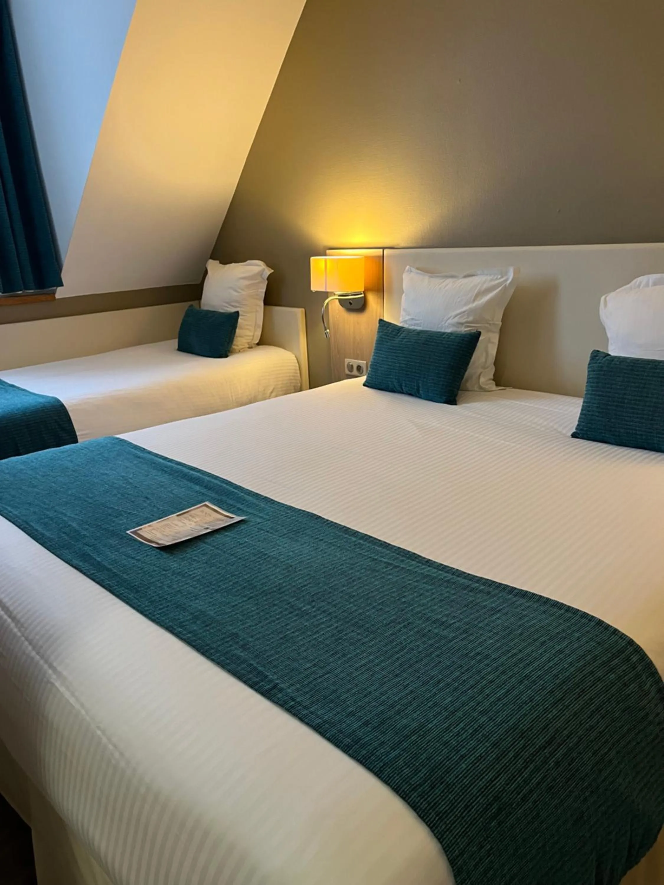 Bed in Hotel Normandy