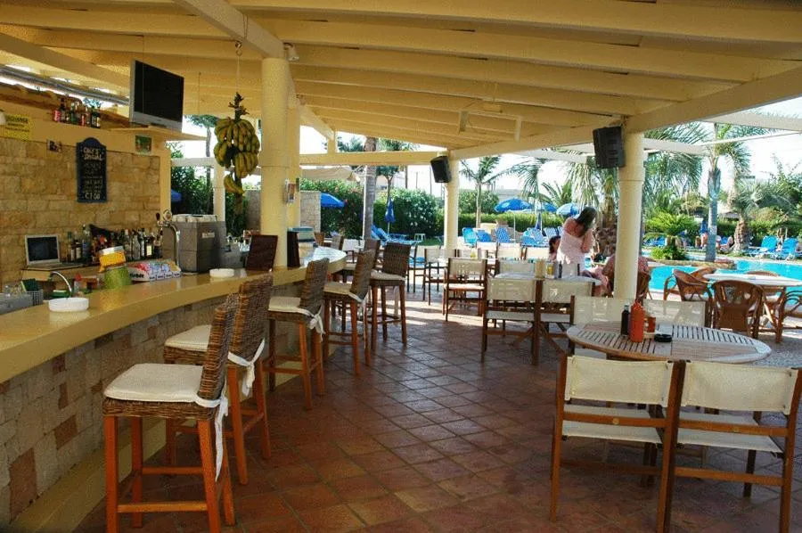 Lounge or bar in Parthenis Hotel & Suites