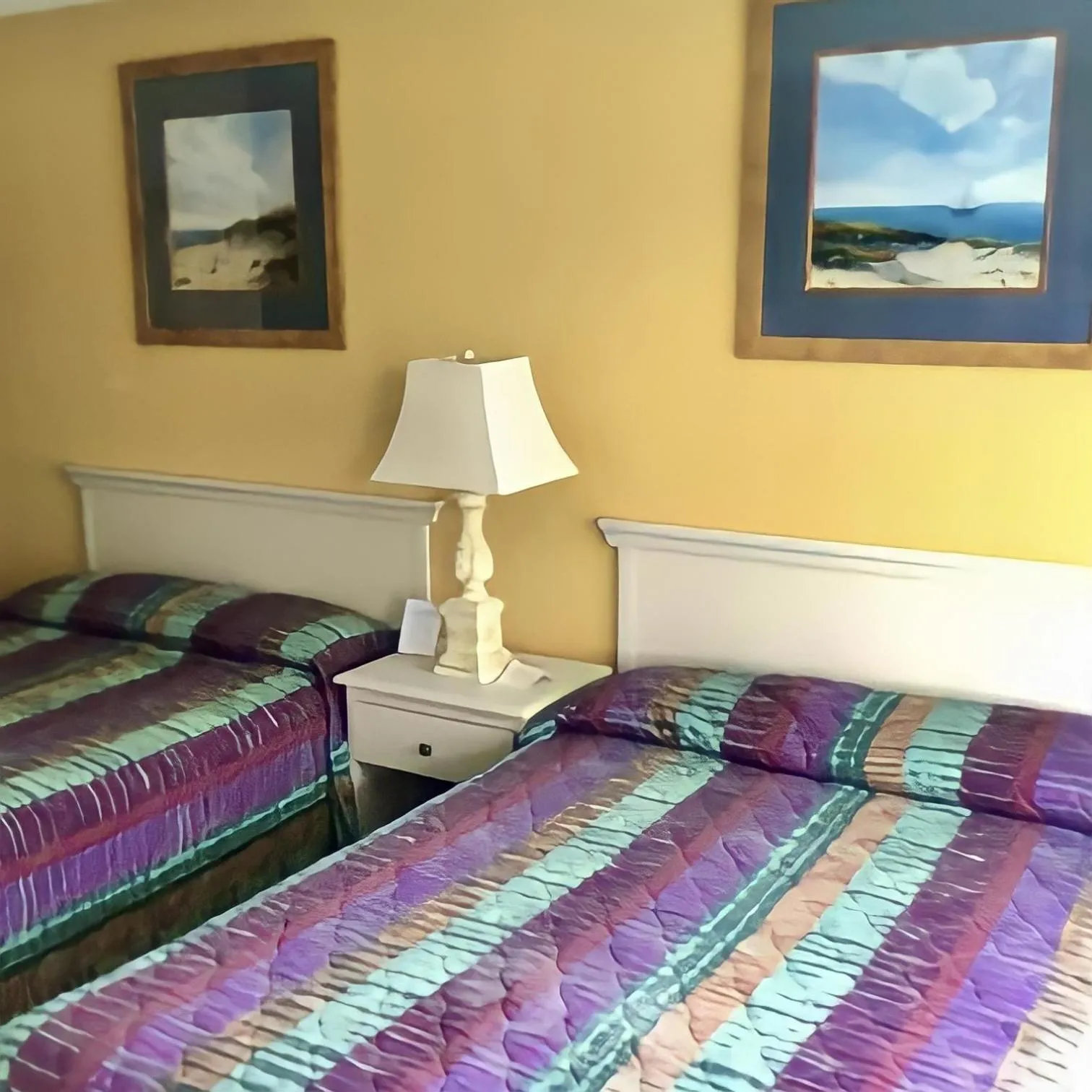 Bed in Beach Colony Motel