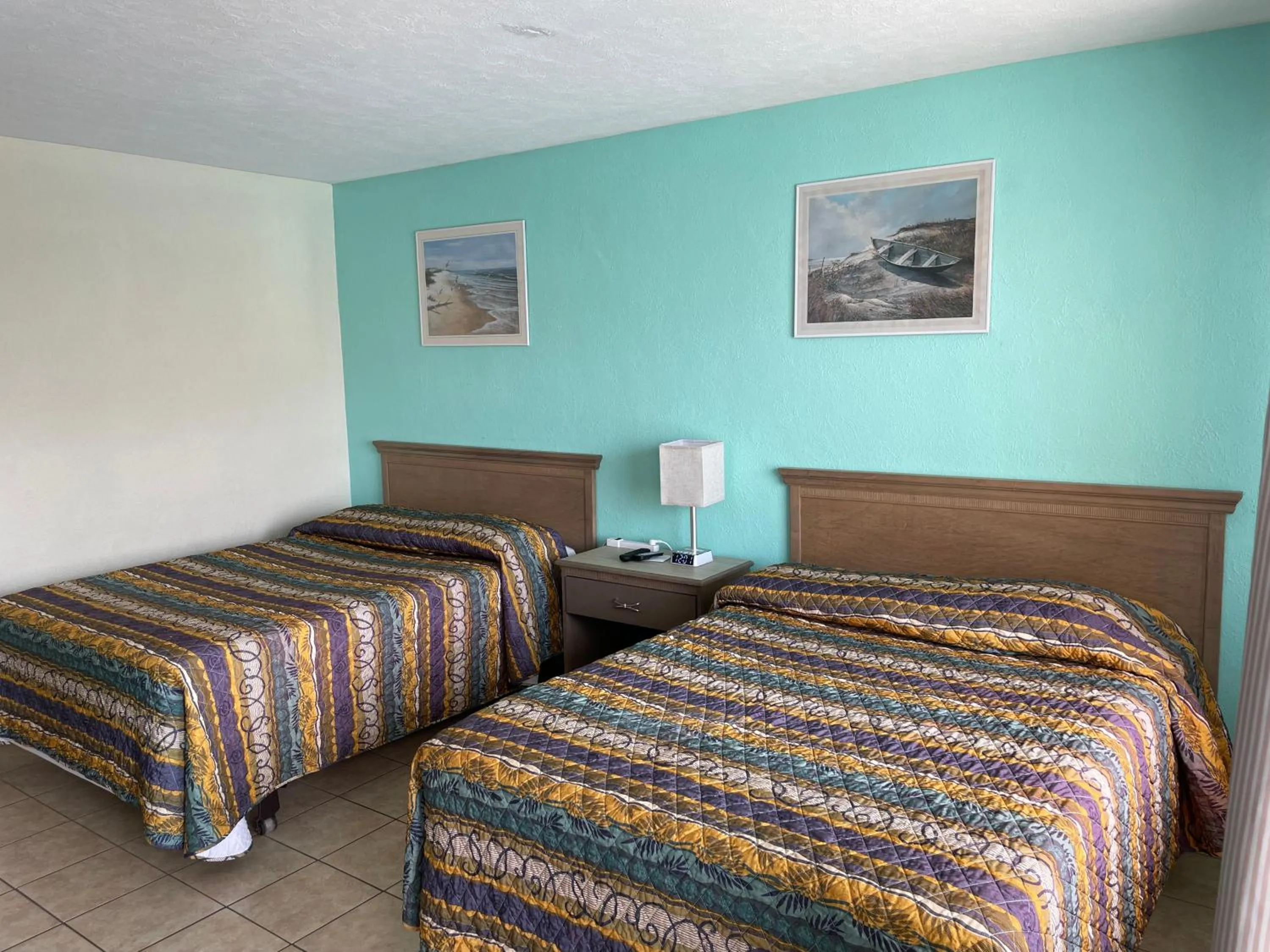 Bed in Beach Colony Motel