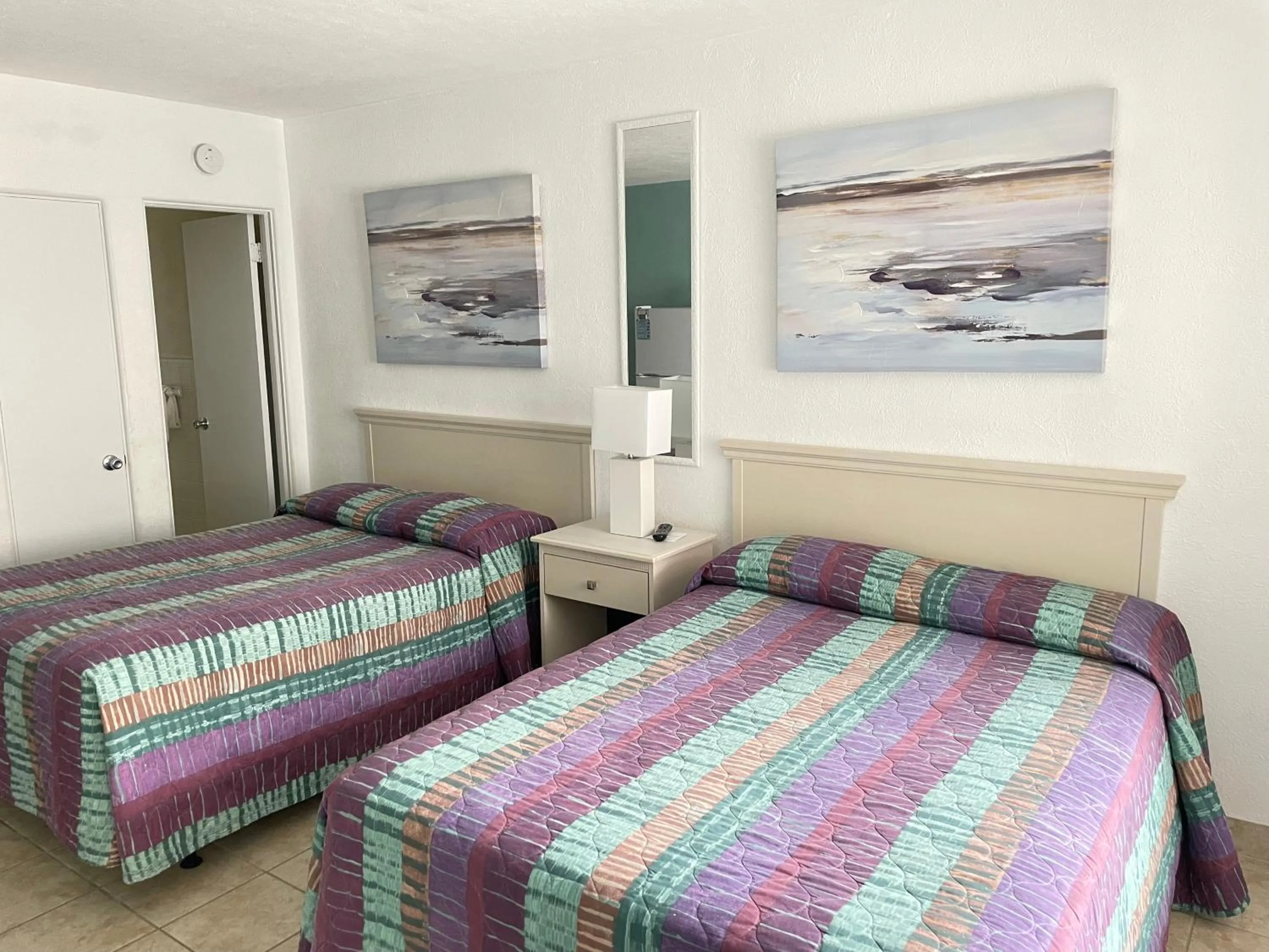 Bed in Beach Colony Motel