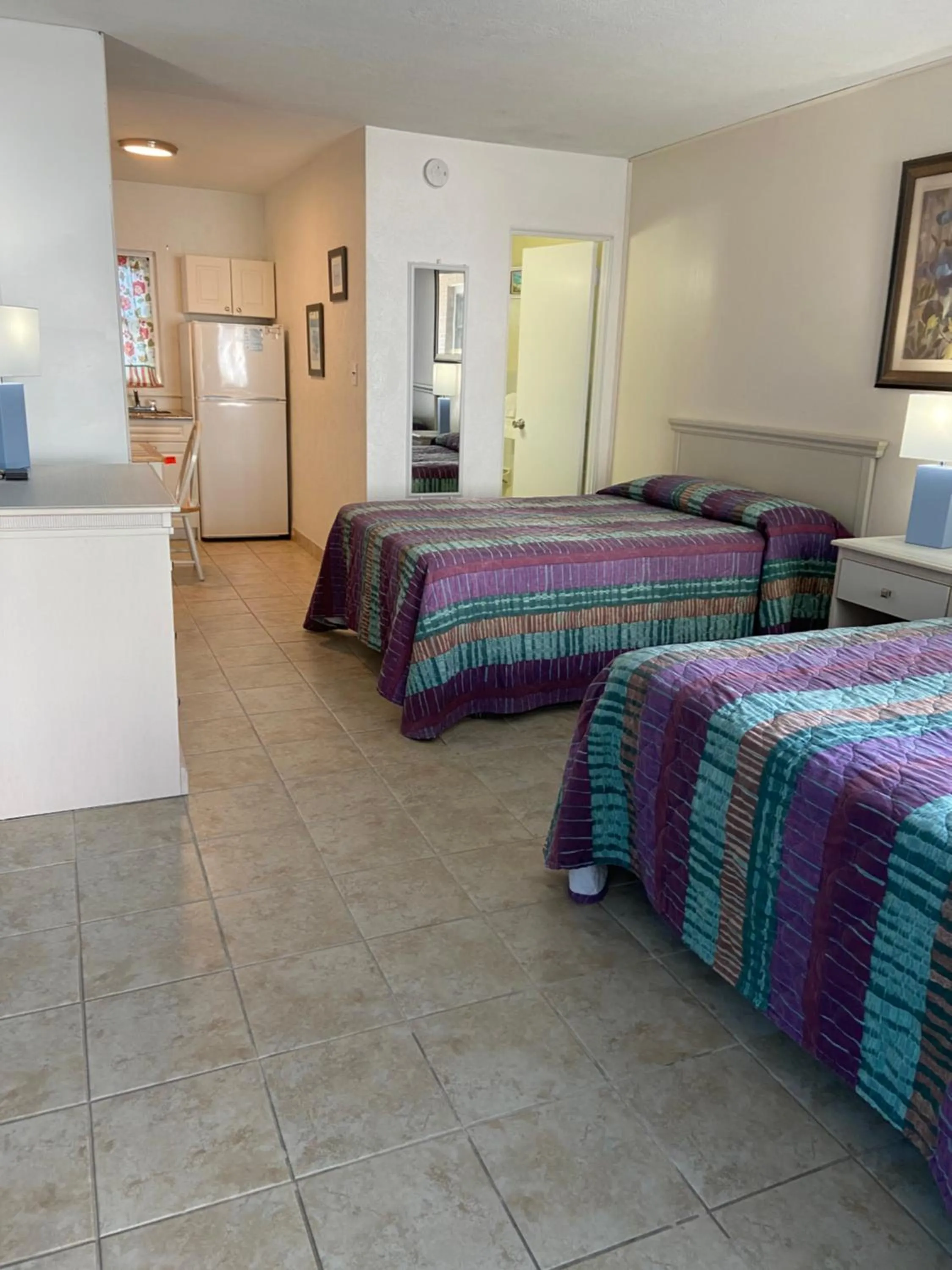 Bed in Beach Colony Motel