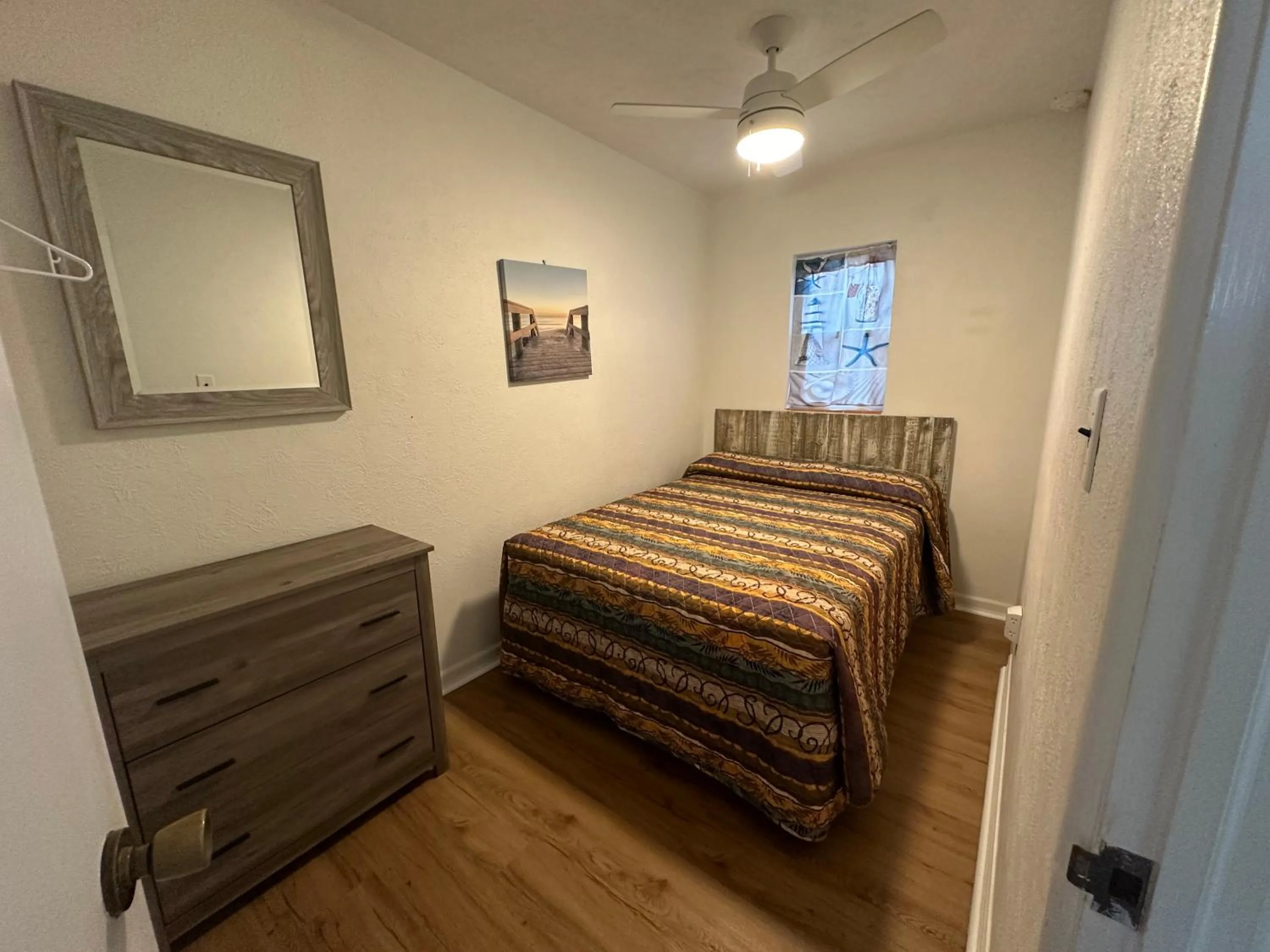 Bed in Beach Colony Motel