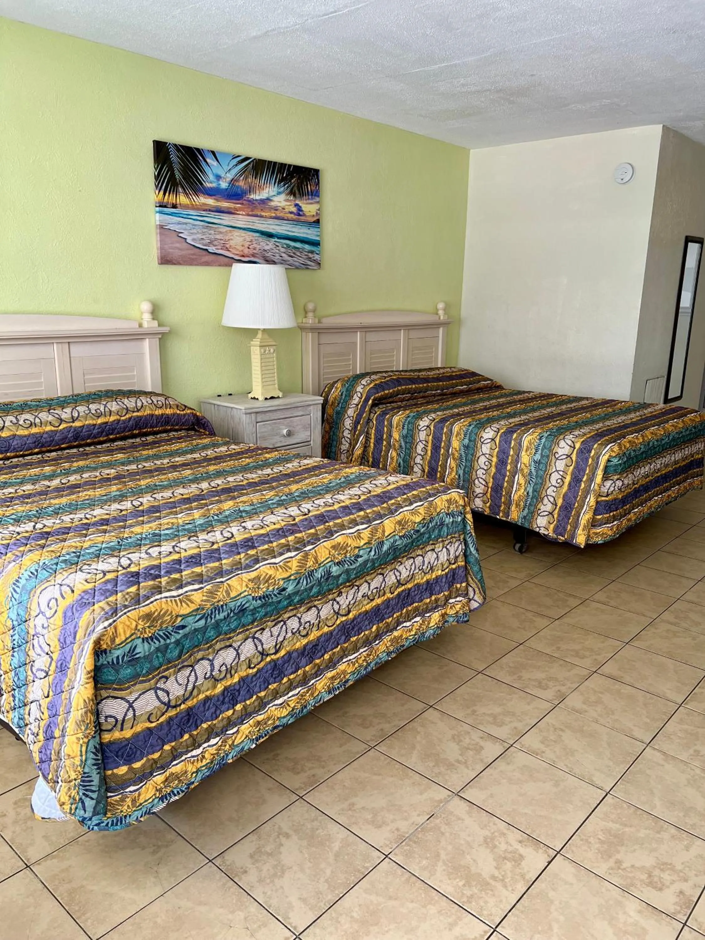 Bed in Beach Colony Motel