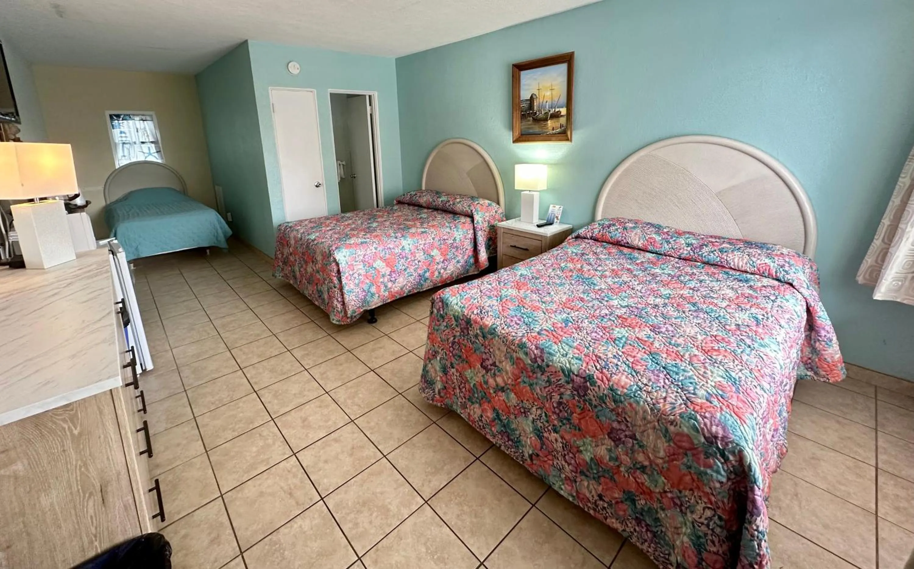 Bed in Beach Colony Motel