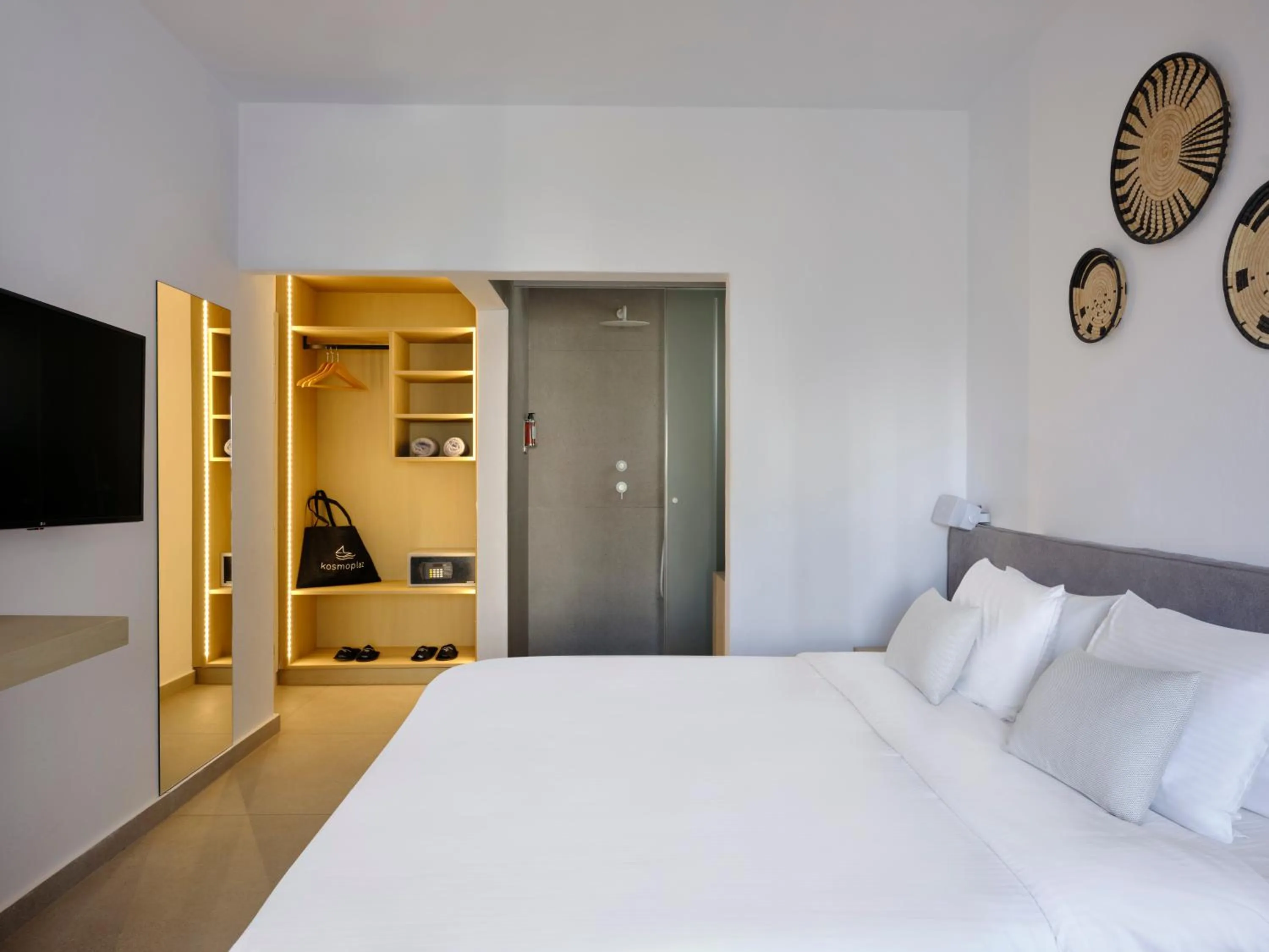 Bed in Mykonos Kosmoplaz Beach Resort Hotel