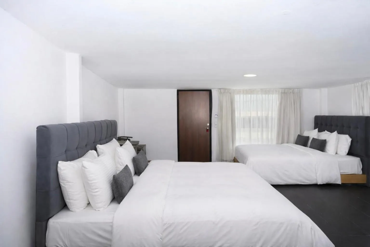 Quadruple Room in Mykonos Kosmoplaz Beach Resort Hotel