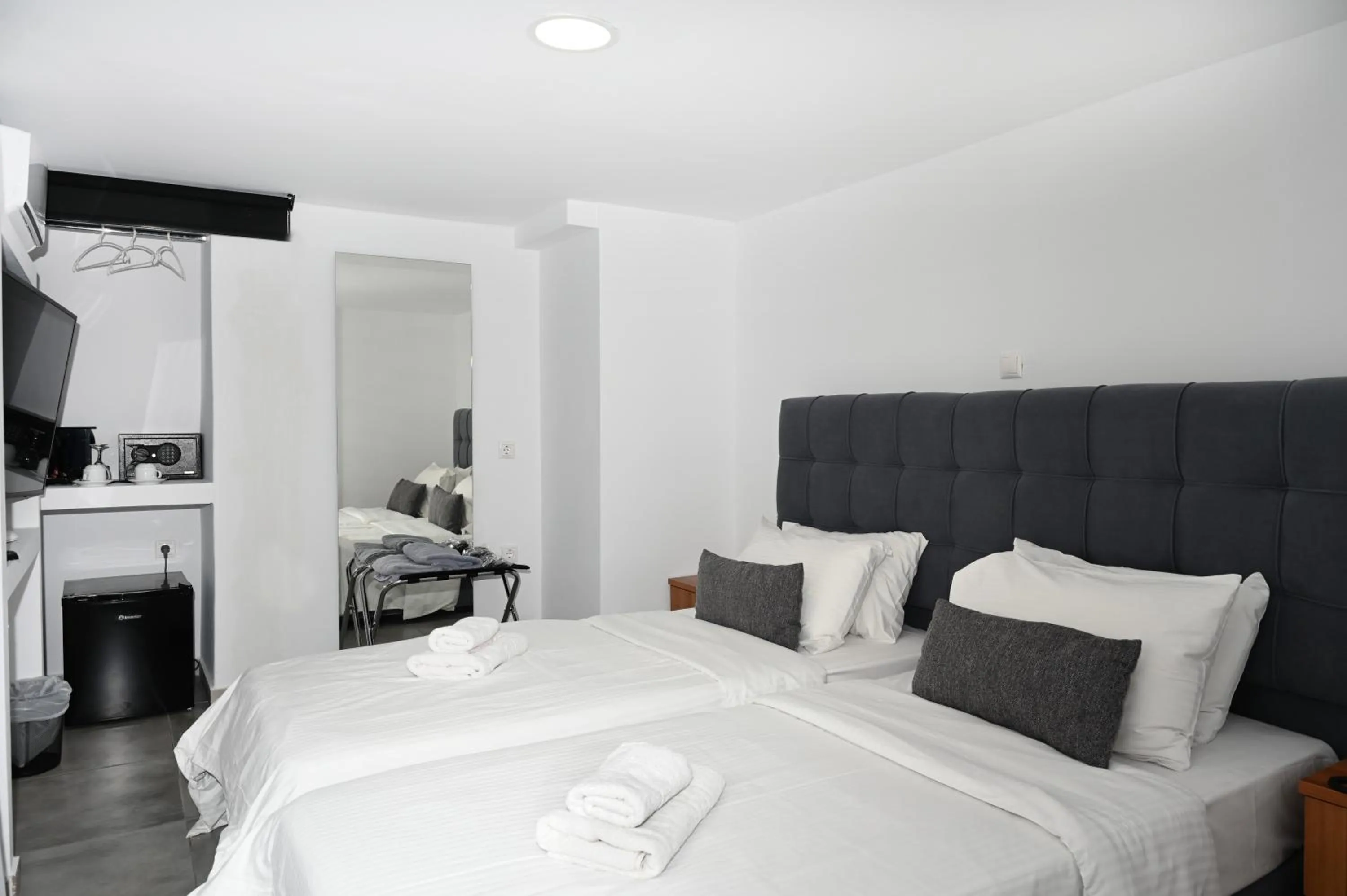 Bed in Mykonos Kosmoplaz Beach Resort Hotel