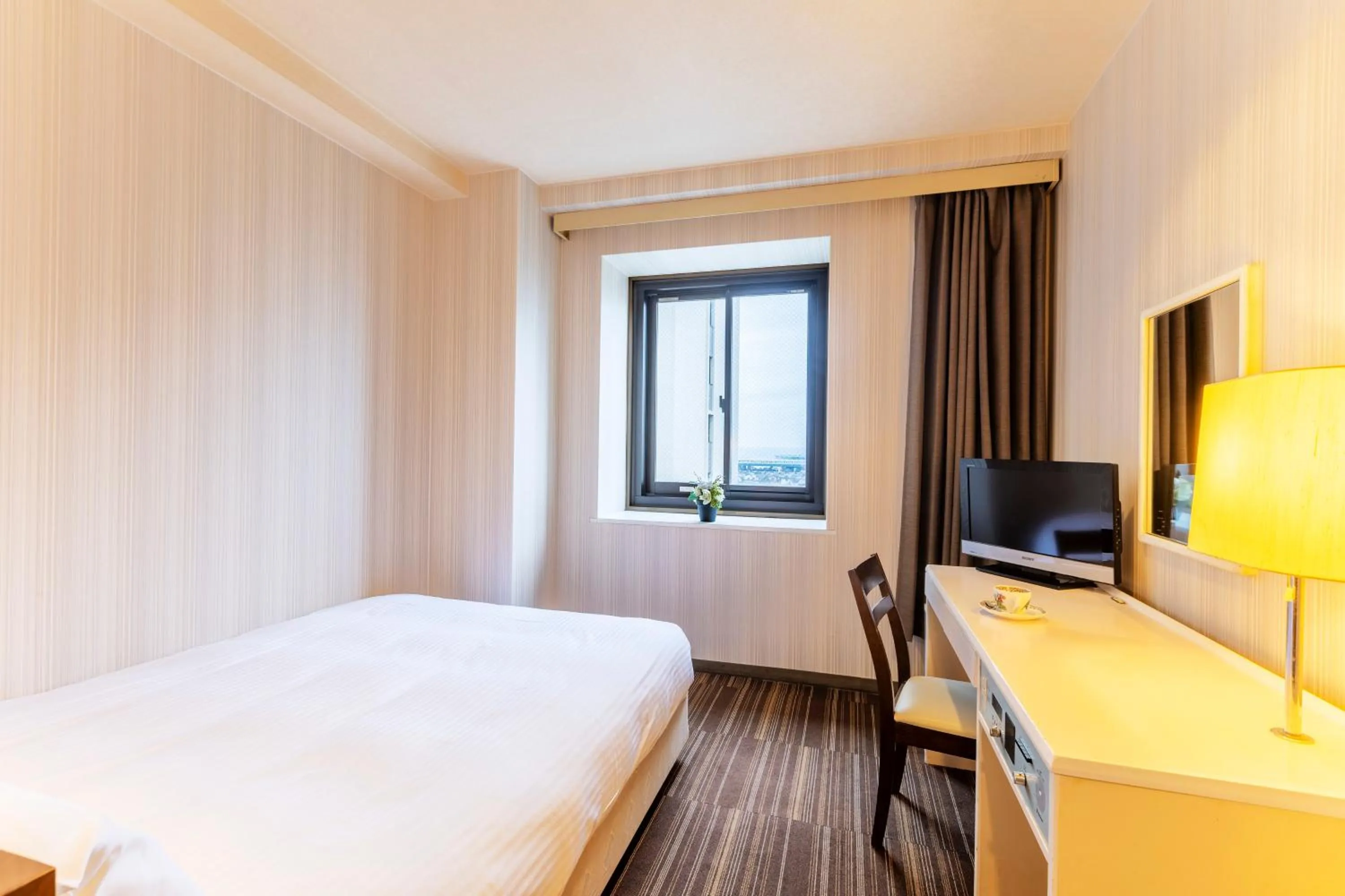 Photo of the whole room, Bed in City Hotel Air Port in Prince