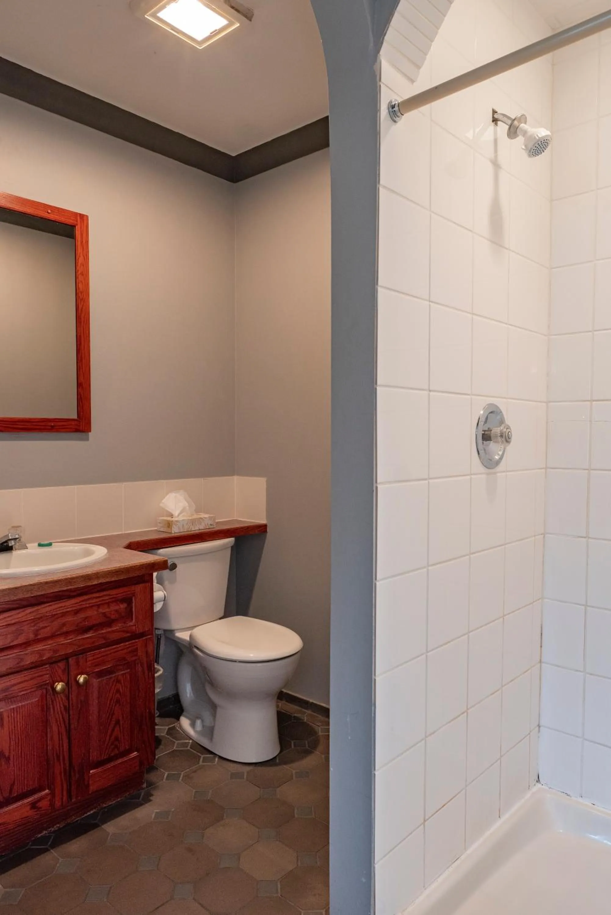 Toilet in Tiki Shores Inn & Suites