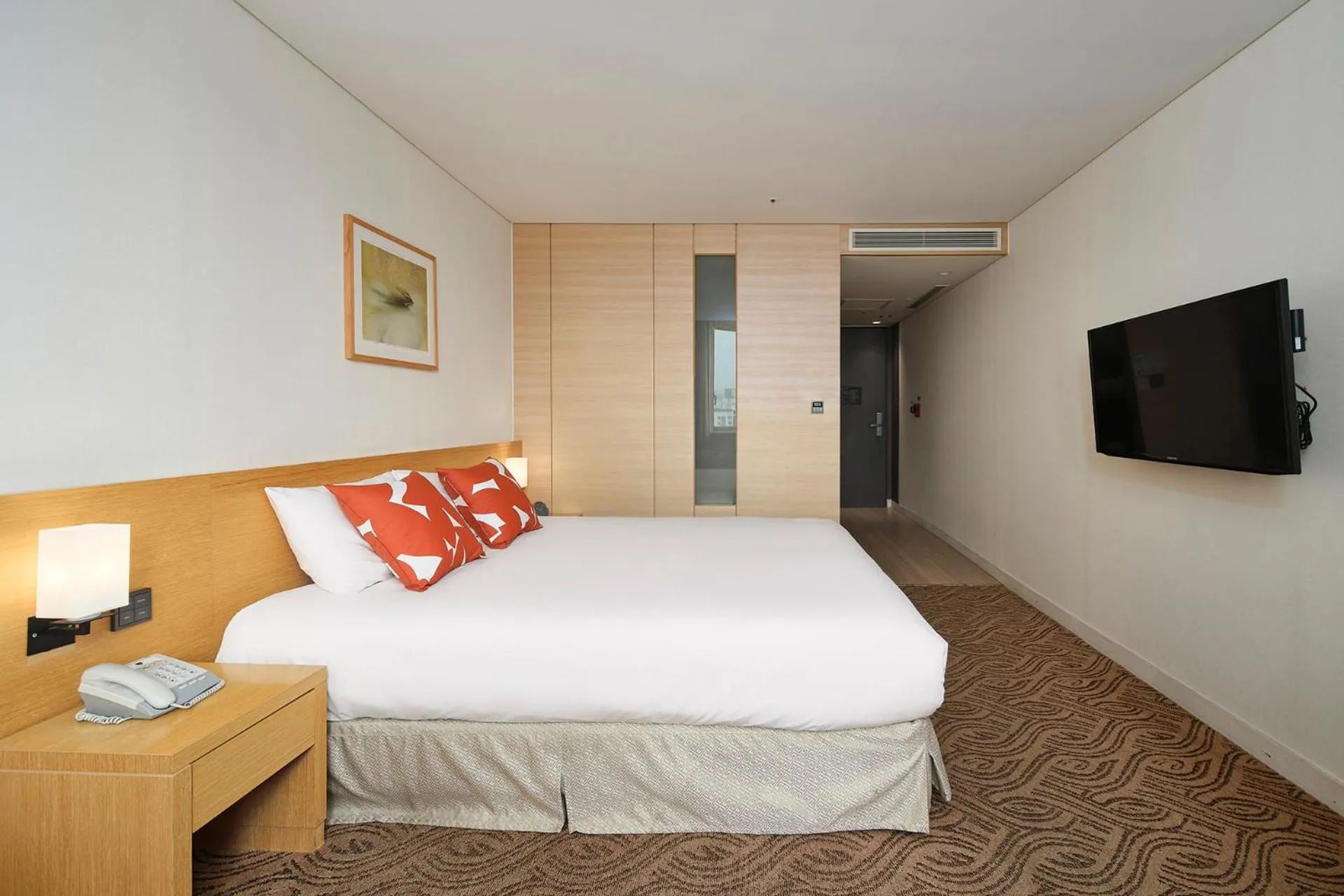 Bed in Jeju Central City Hotel