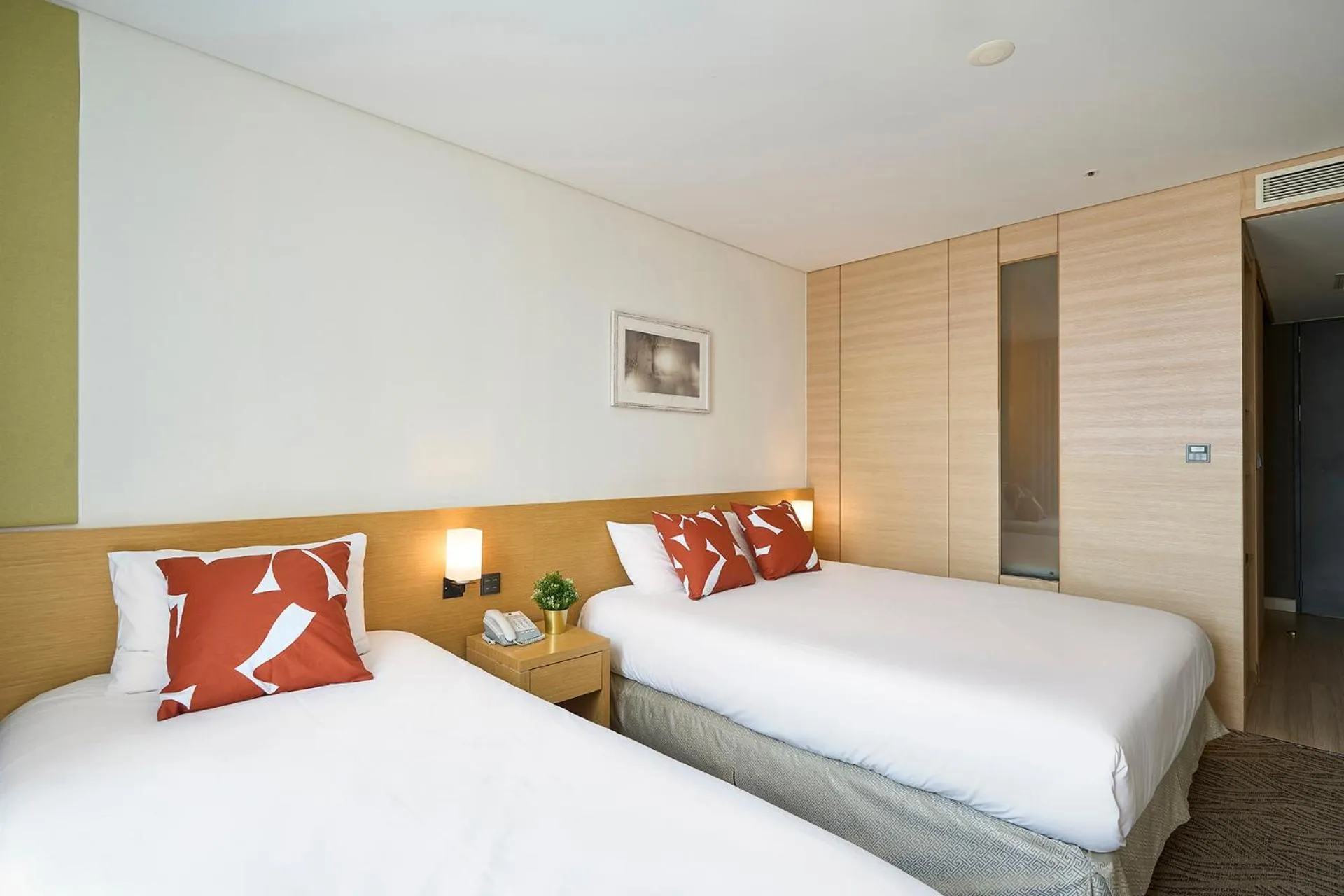 Bed in Jeju Central City Hotel