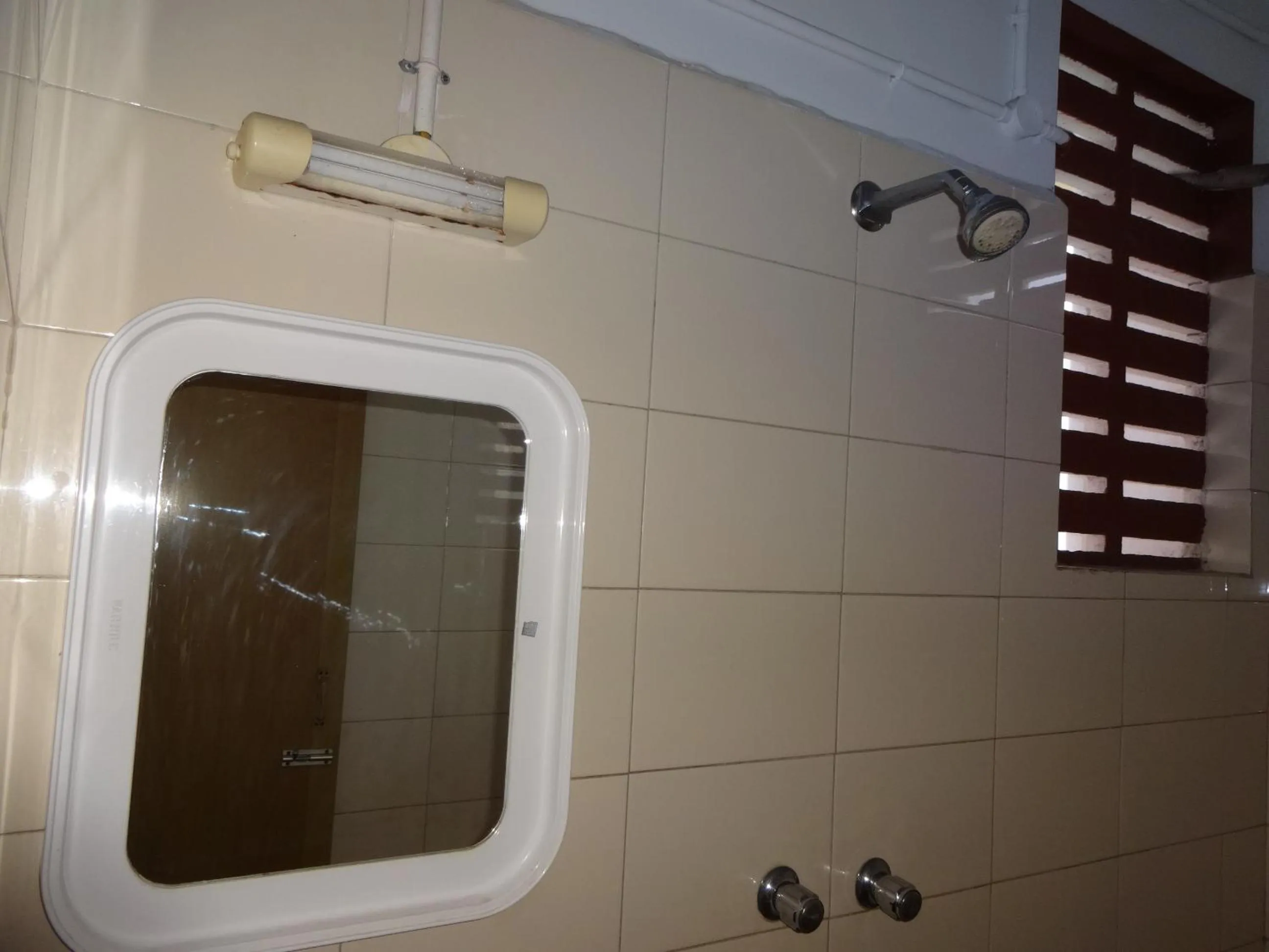 Bathroom in Aditya Inn