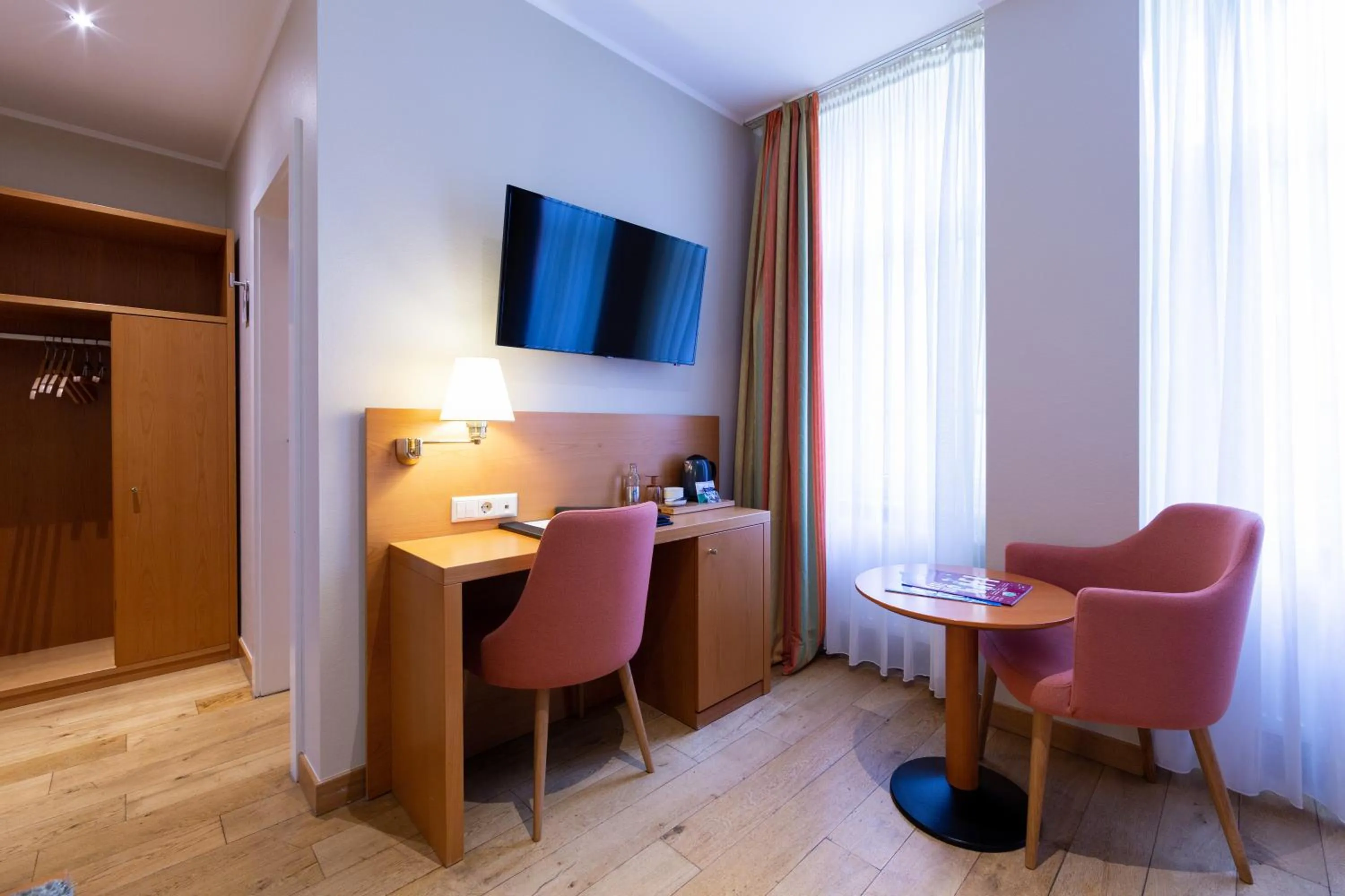 Bedroom in Hotel Perrin - former Carlton