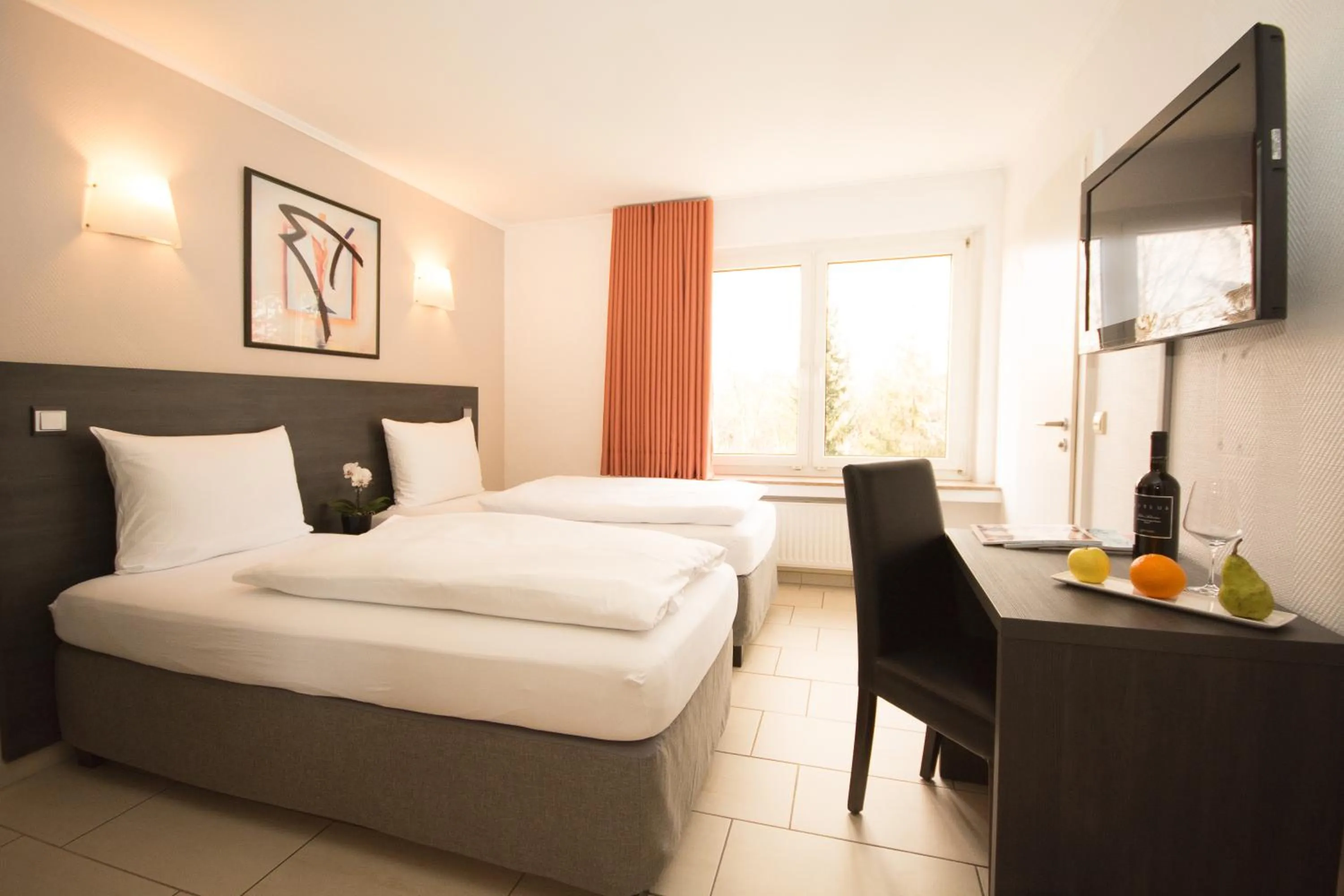 Photo of the whole room, Bed in BIVIUS Hotel Restaurant Luxembourg